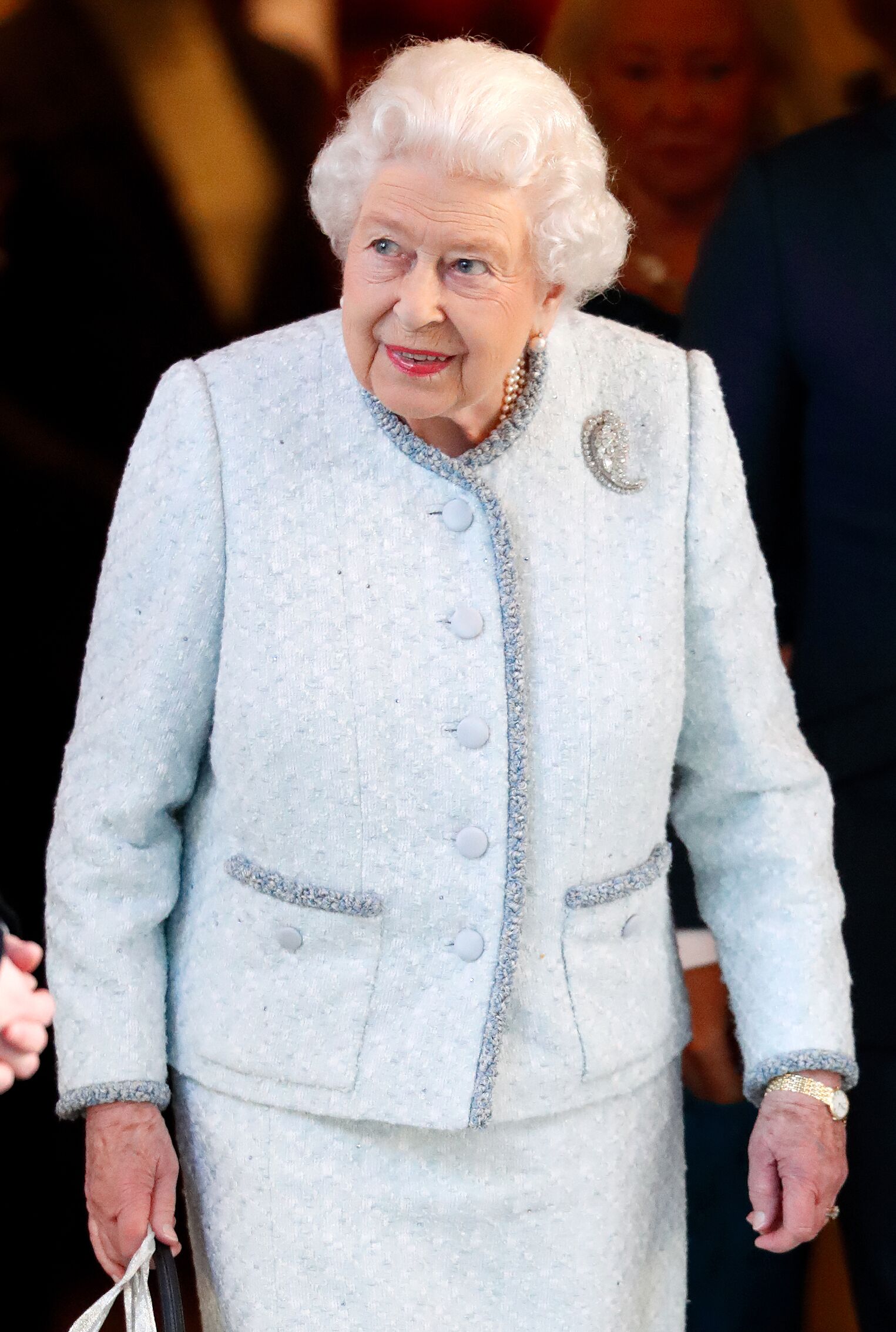 La reine elizabeth II lors d'un déjeuner de Noël | Photo : Getty Images