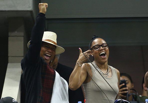 Queen Latifah and Eboni Nichols cheer for their friend Serena Williams during day 10 of the 2016 US Open at USTA Billie Jean King National Tennis Center on September 7, 2016  | Photo: Getty Images