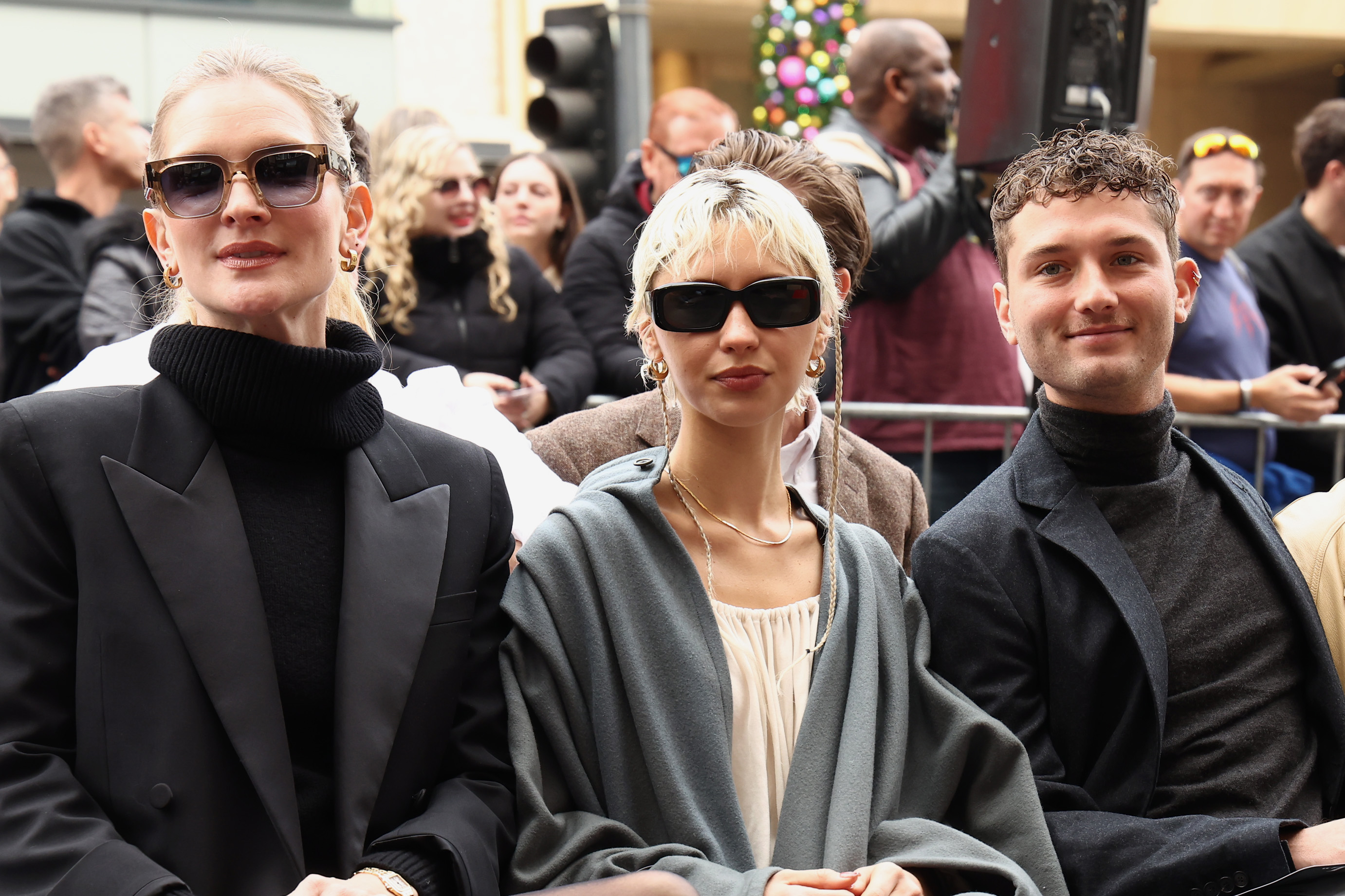 Phillipa Coan, Iris Law, and Raff Law on December 12, 2024, in Hollywood, California | Source: Getty Images