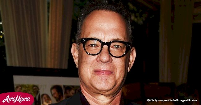 Tom Hanks rocks a rare bright outfit from the 'Mister Rogers' movie