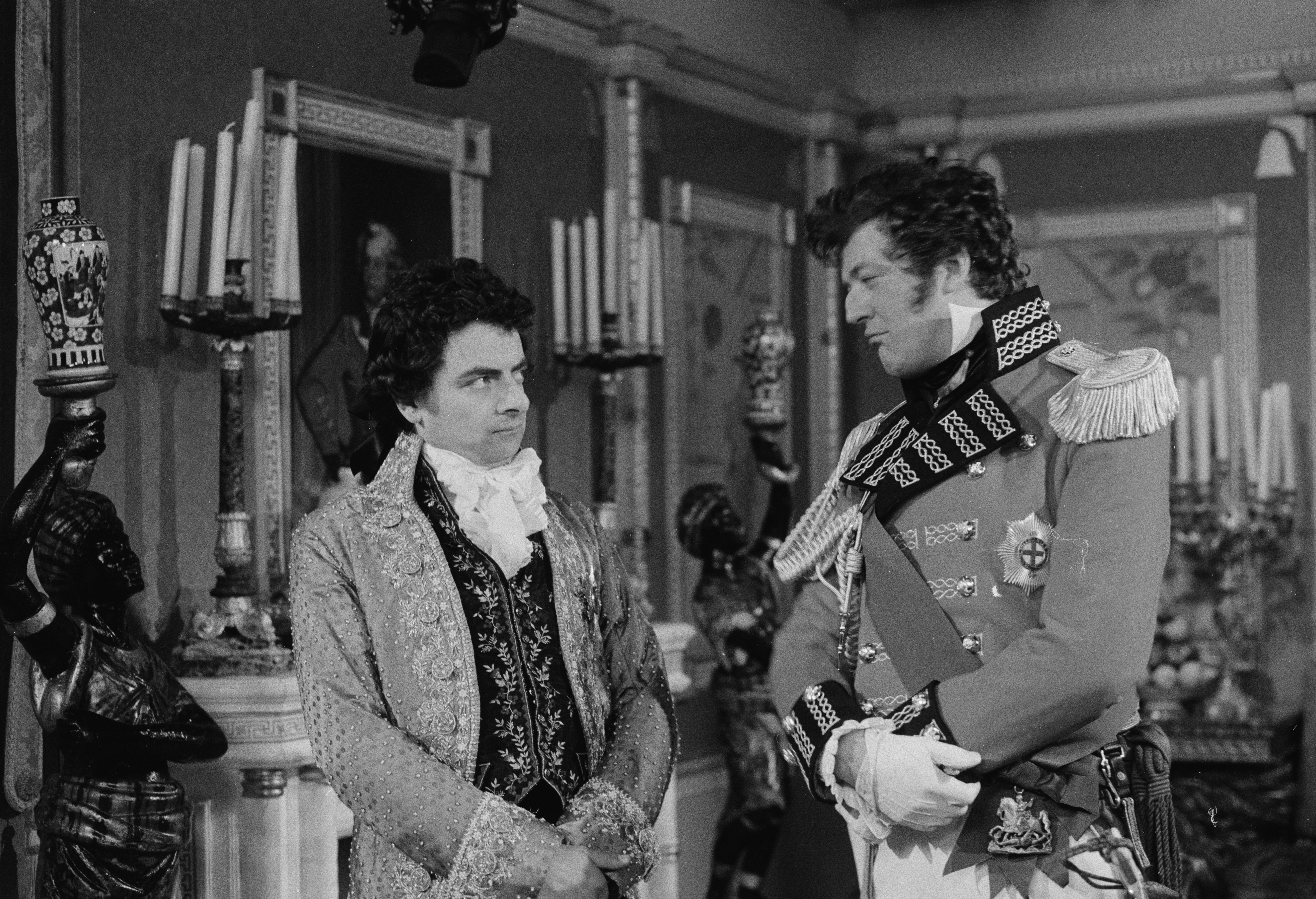 Actors Rowan Atkinson (left) and Stephen Fry in a scene from episode 'Duel and Duality' of the BBC television series 'Blackadder the Third', July 3, 1987. | Source: Getty Images