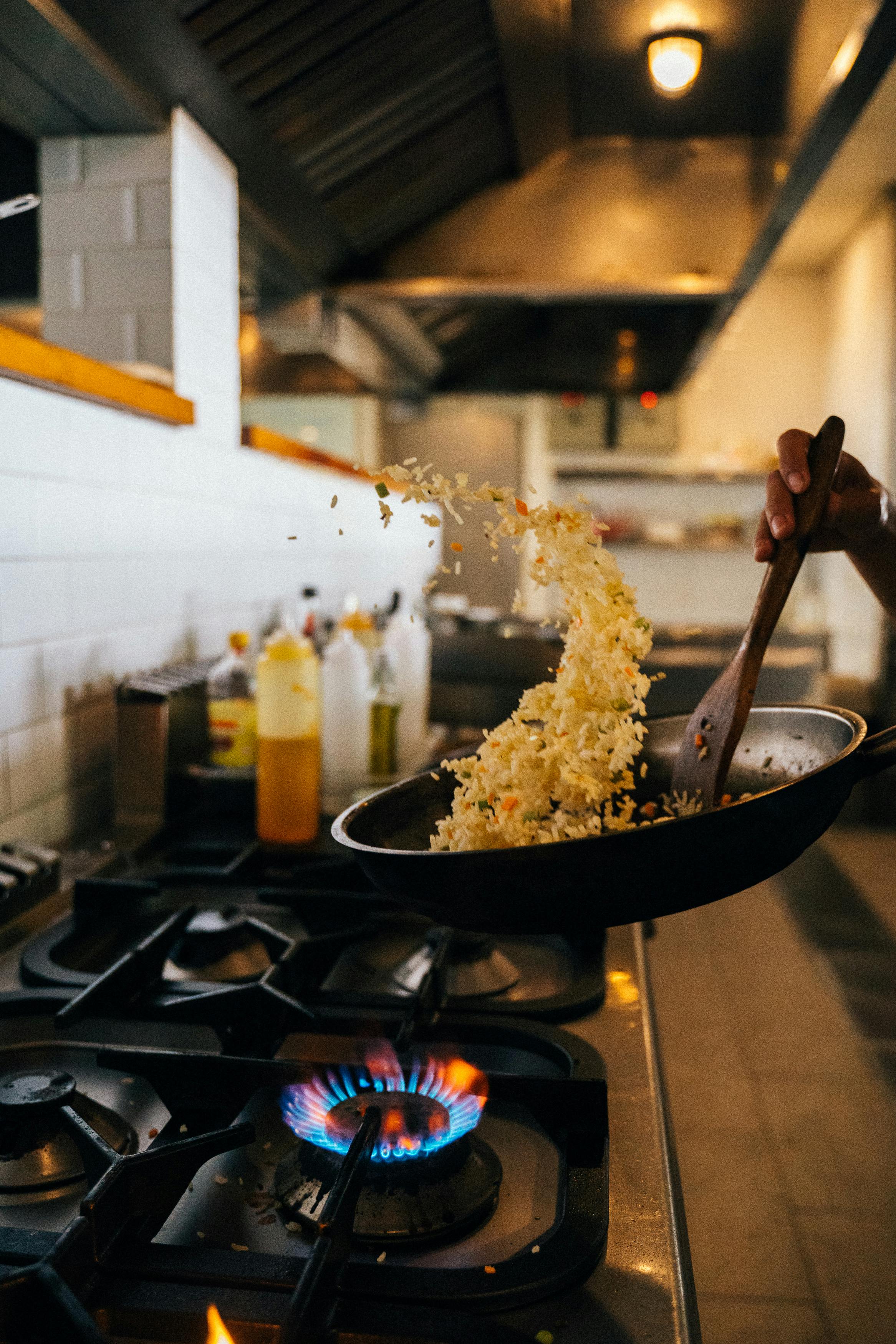 A person cooking in the kitchen | Source: Pexels