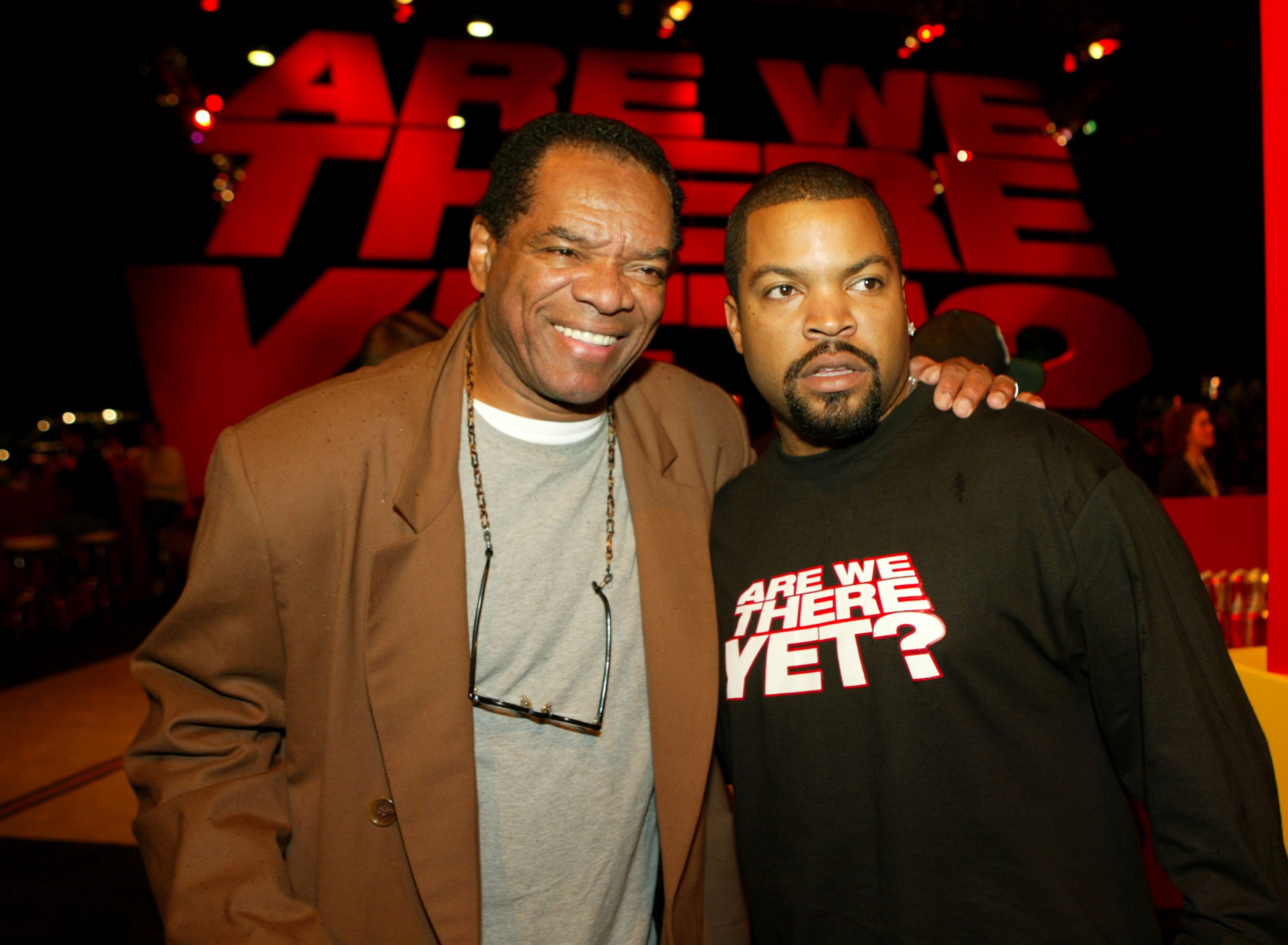 John Witherspoon & Ice Cube pose at the after party of the premiere of "Are We There Yet" on Jan. 9, 2005 in California | Photo: Getty Images