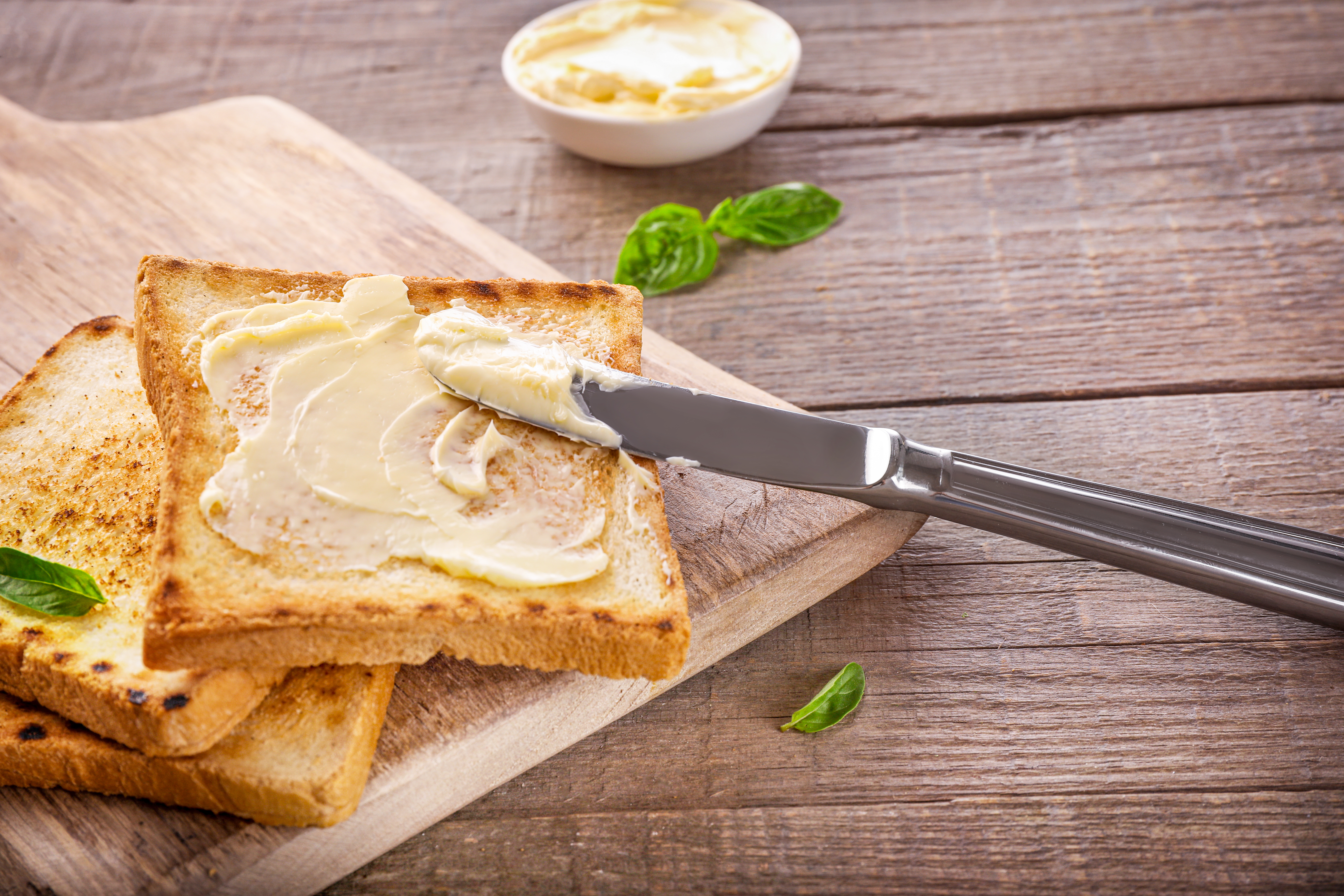 Toast spread with margarine | Source: Shutterstock