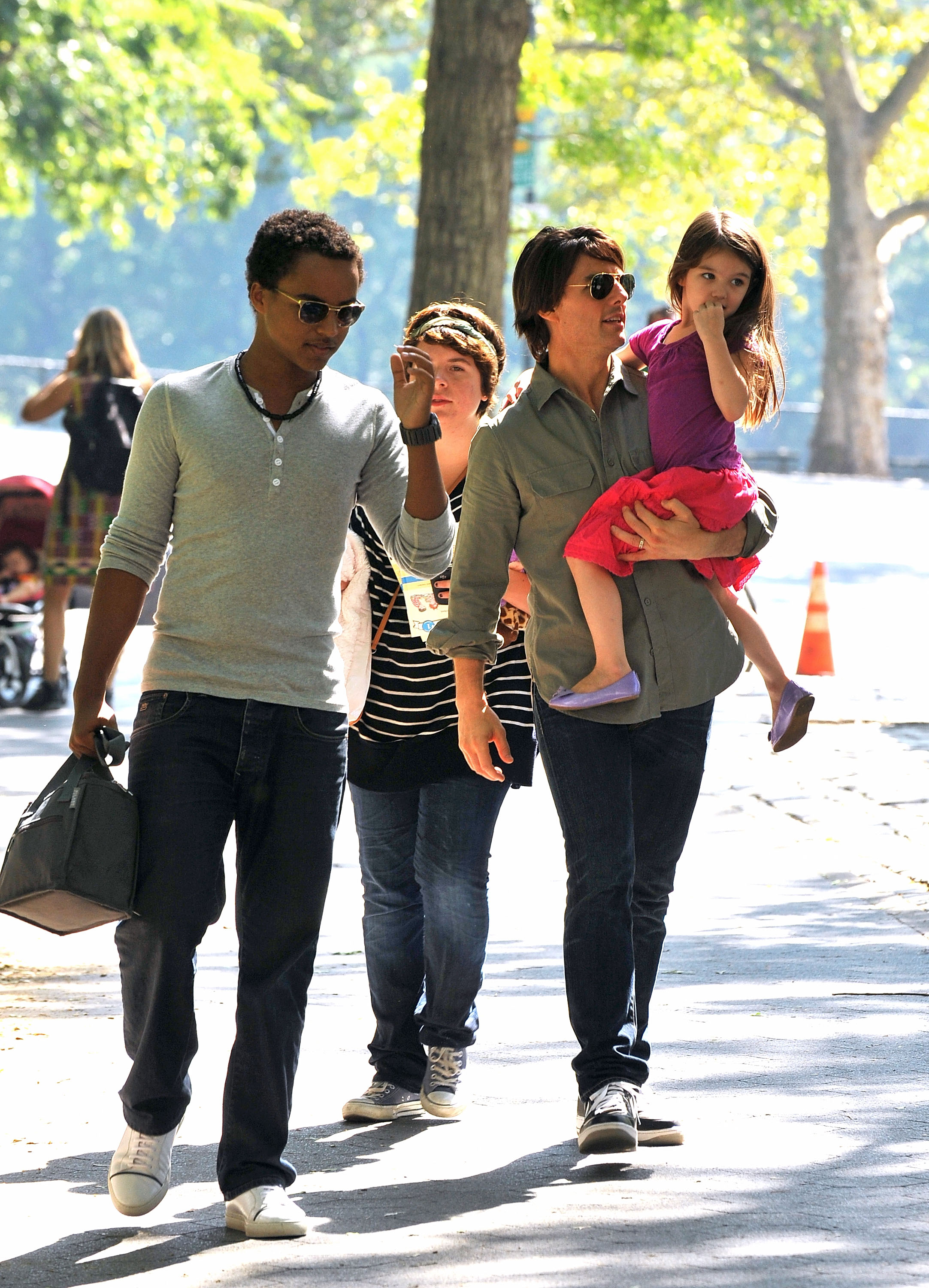 Tom Cruise with his children Connor, Isabella, and Suri at a Central Park West playground on September 7, 2010 in New York City | Source: Getty Images