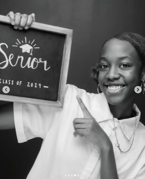 Shania Green holding a "Senior" placard posted on January 4, 2024 | Source: Instagram/cghseniors24