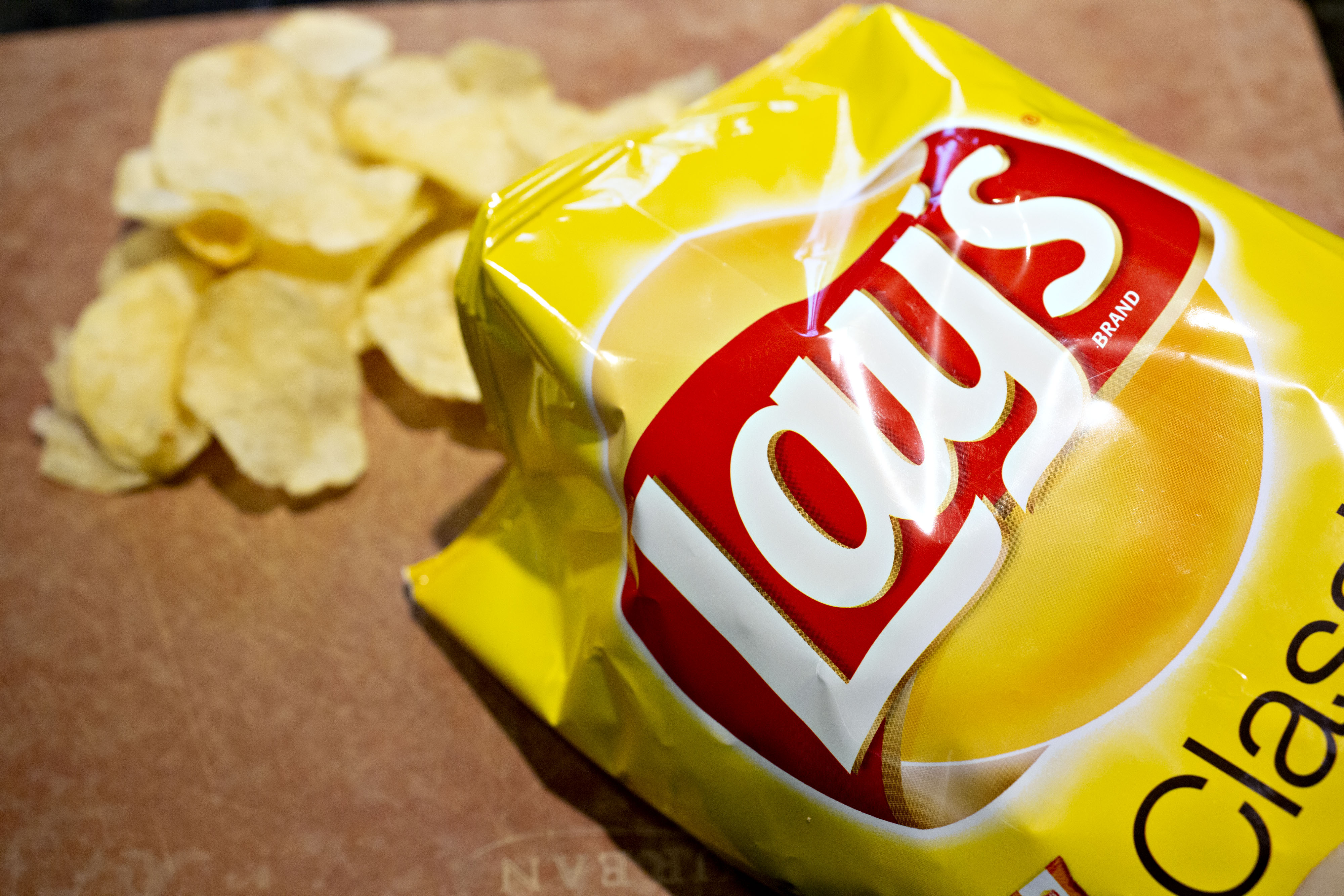 A photo of a bag of opened Lay's Classic chips taken in Tiskilwa, Illinois on April 17, 2019 | Source: Getty Images