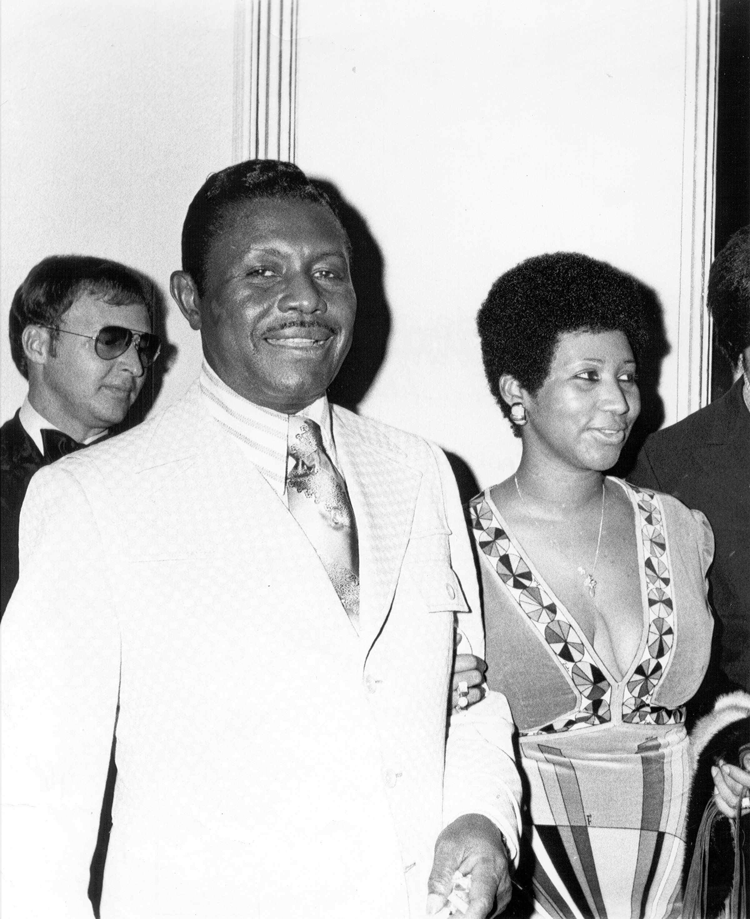 The Reverend C.L. Franklin and his daughter singer Aretha Franklin attend an event circa 1975. | Source: Getty Images