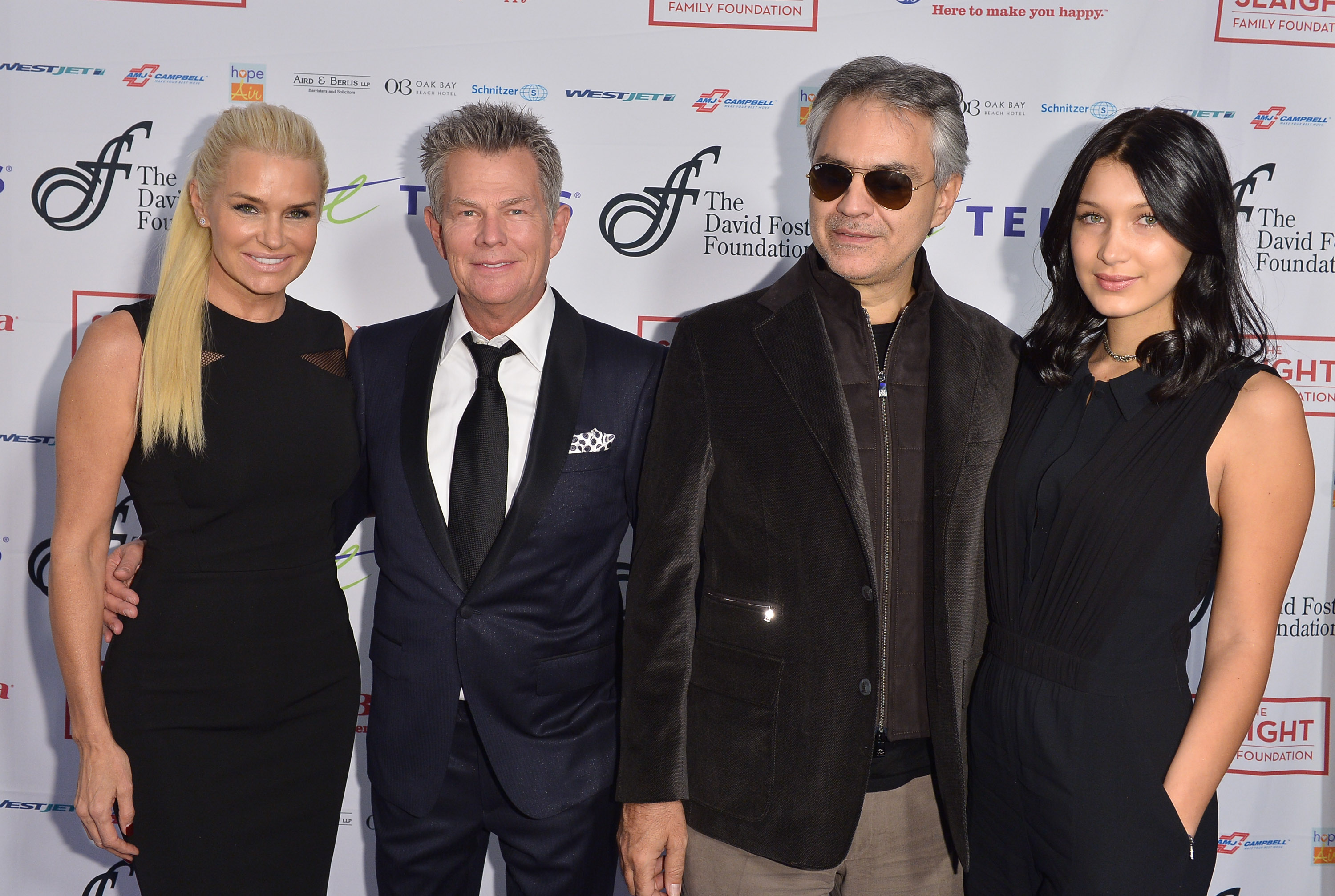 Yolanda Hadid, David Foster, Andrea Bocelli, and the girl at the David Foster Foundation benefit concert in Toronto, Canada on December 5, 2013 | Source: Getty Images