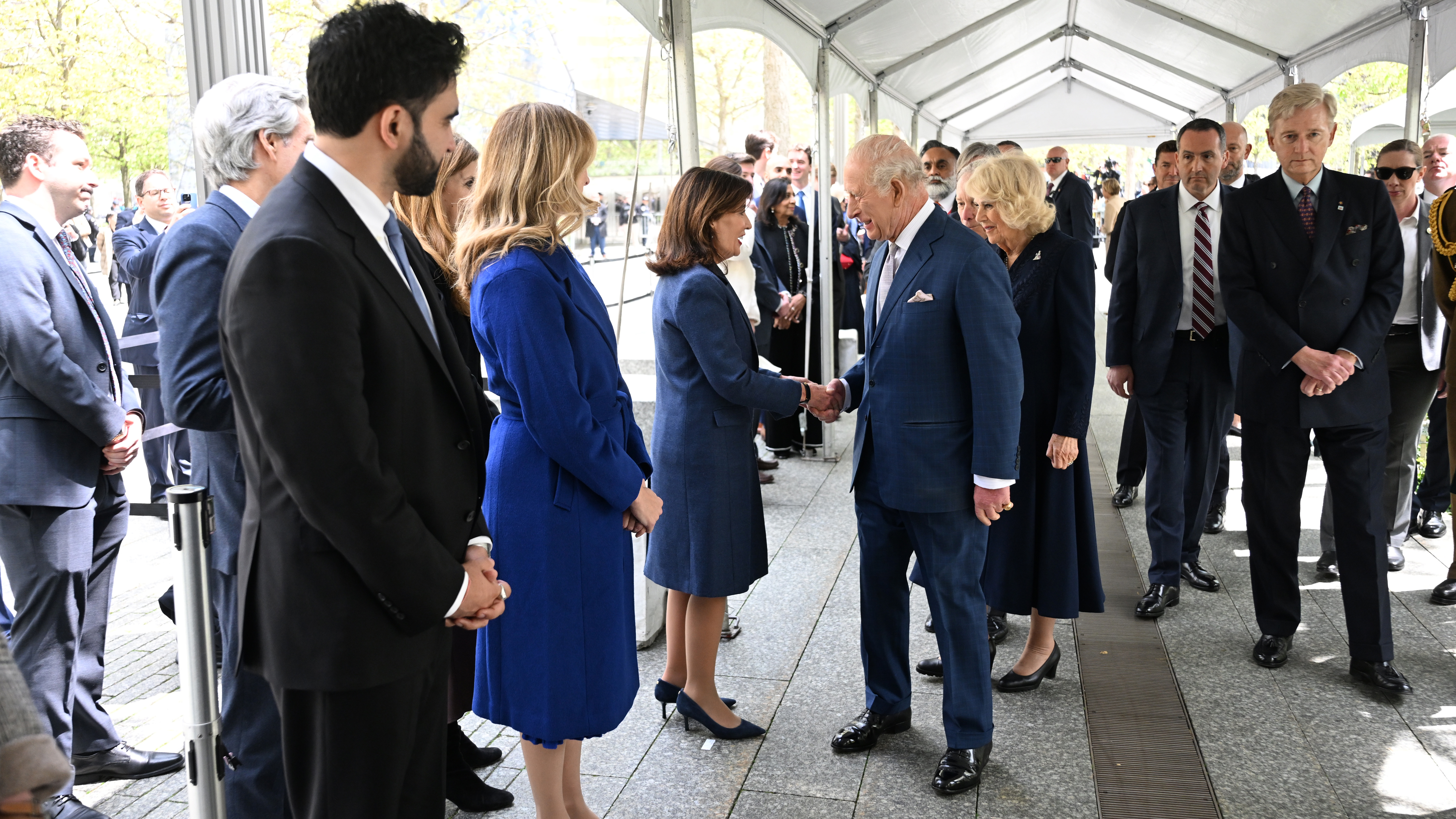 New York Governor Kathy Hochul shakes hands with King Charles III as  New York City Mayor Zohran Mamdani and Queen Camilla stand nearby at the 9/11 Memorial on April 29, 2026 | Source: Getty Images