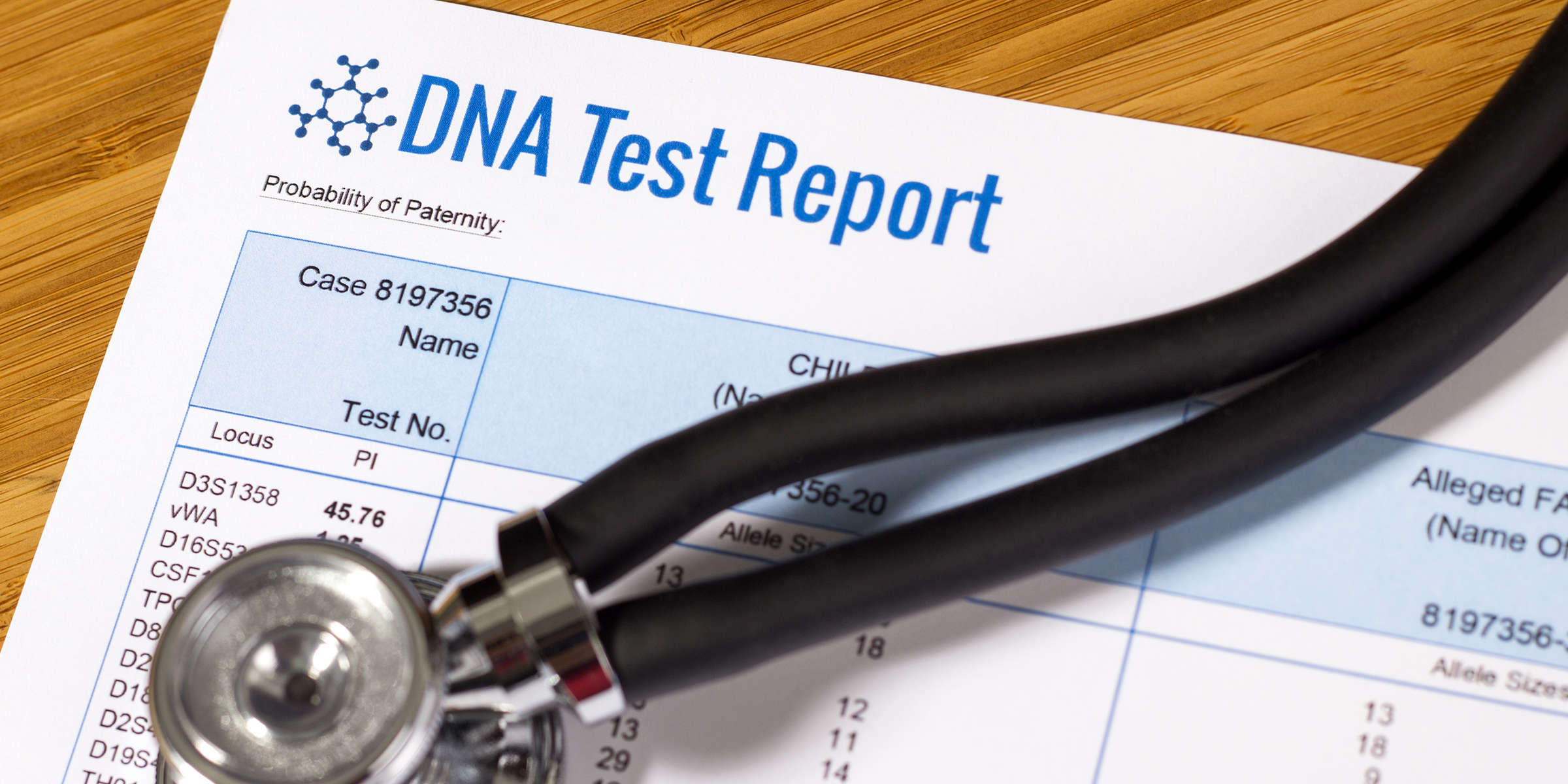 A DNA test with a stethoscope on top of it | Source: Shutterstock
