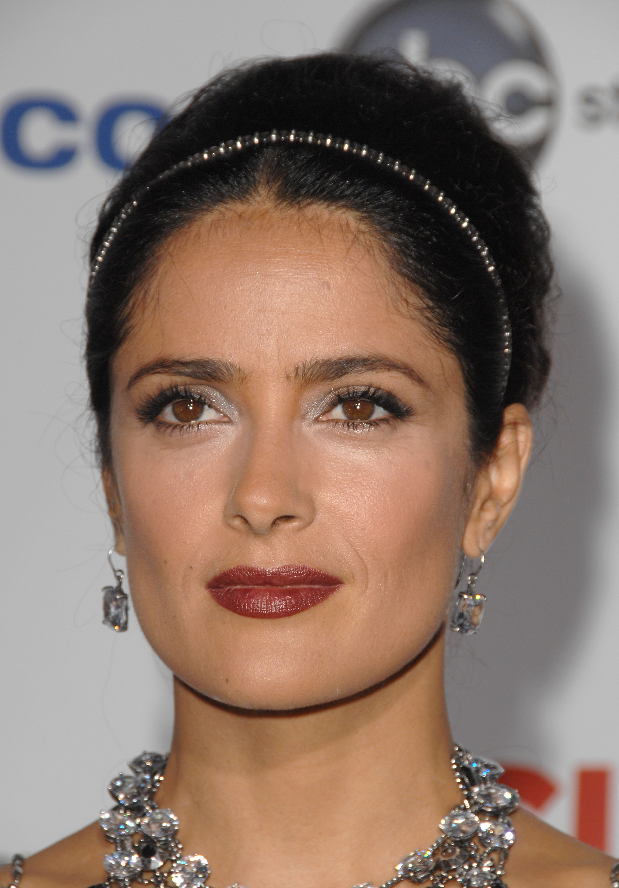This close-up offers another point of comparison from a period when Hayek was already a major red-carpet fixture. Her features and makeup choices have long been part of the public fascination around her image.
