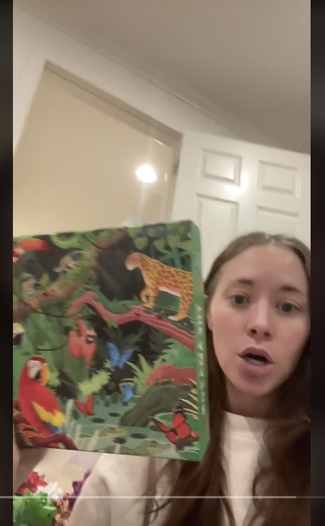 Elizabeth holding up a puzzle in a video dated December 1, 2023 | Source: tiktok.com/@elizabethacting