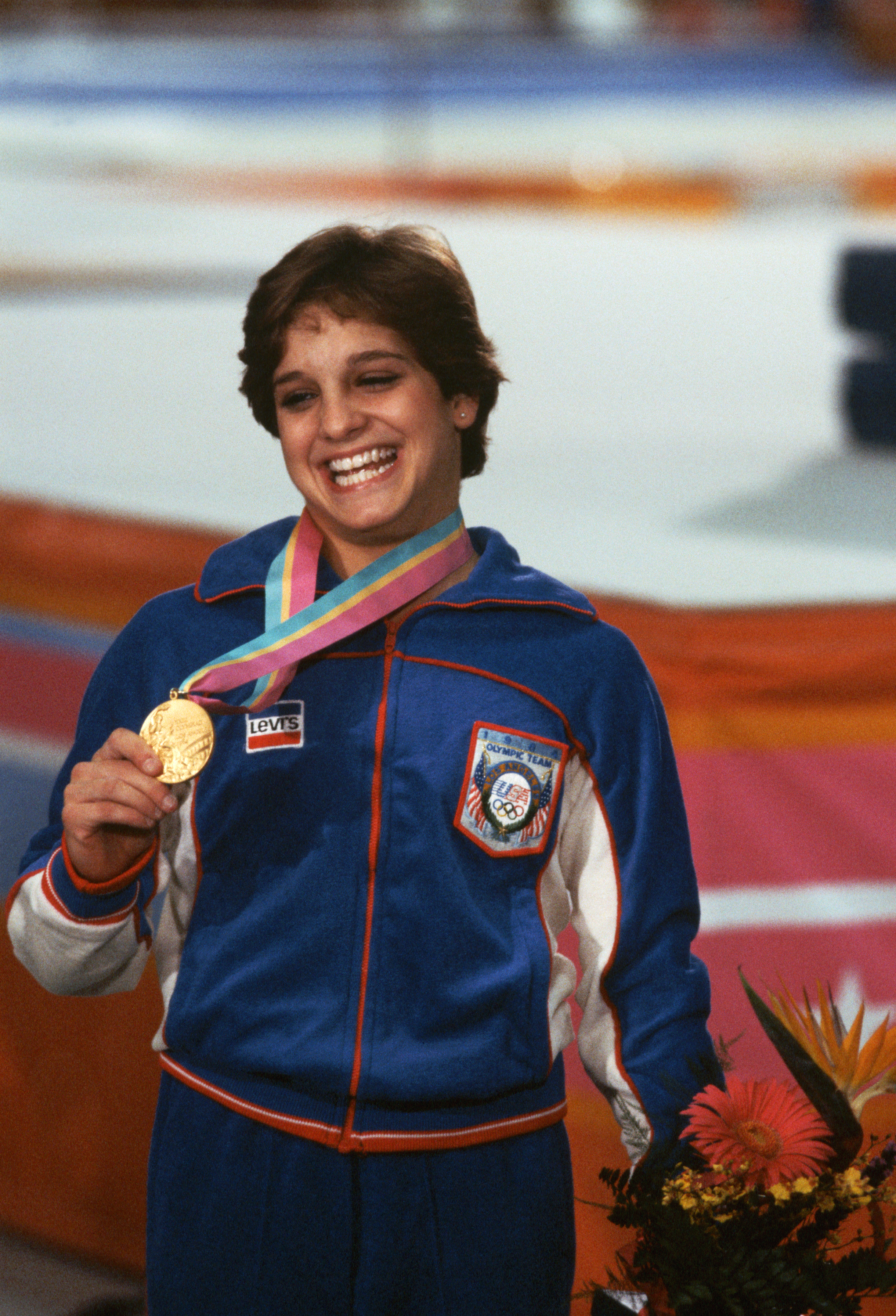 Mary Lou Retton poses with her Olympic medal in 1984 in Los Angeles, California | Source: Getty Images