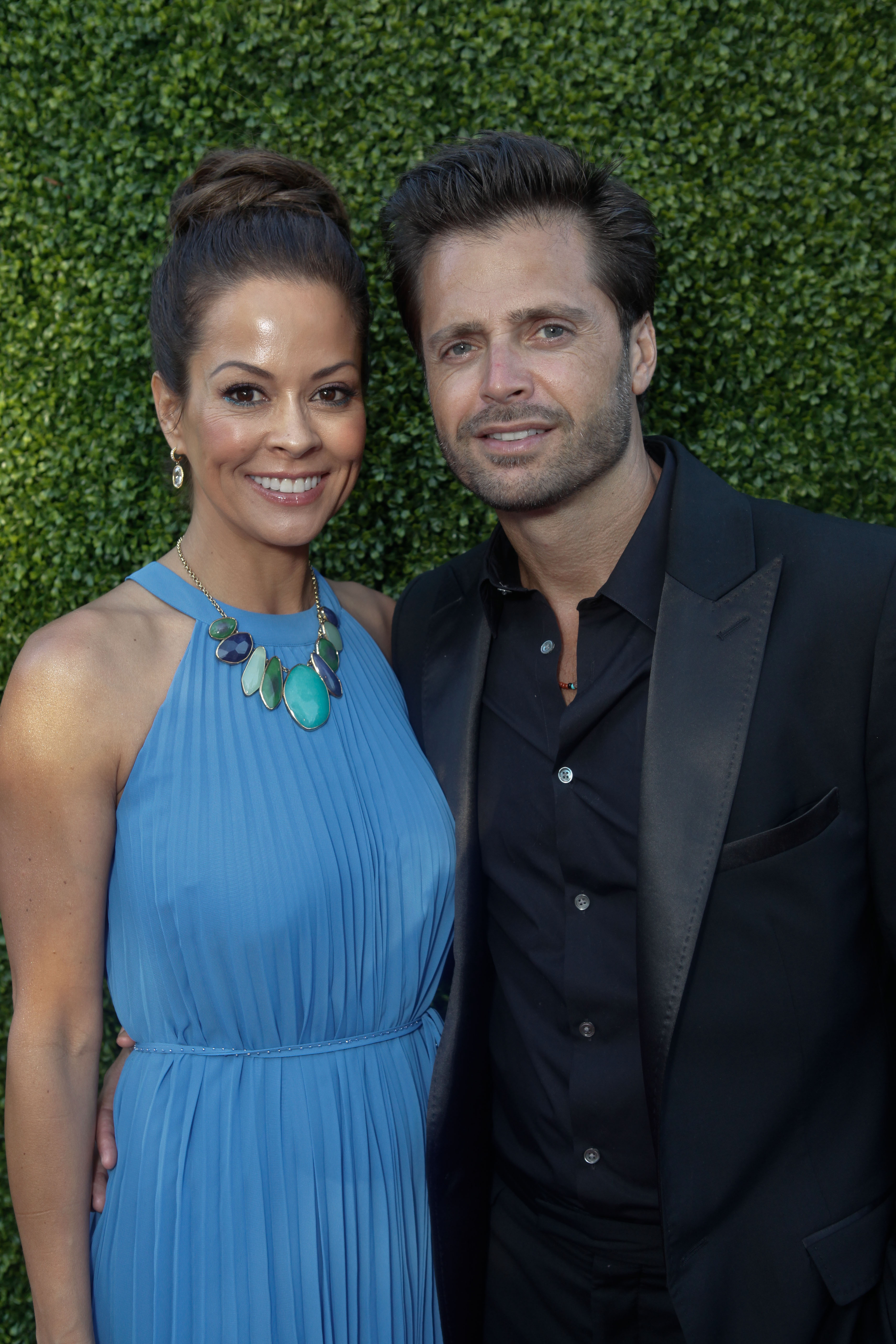 Brooke Burke and David Charvet attend the HollyRod Foundation's 14th Annual Design Care on July 21, 2012, in Malibu, California. | Source: Getty Images