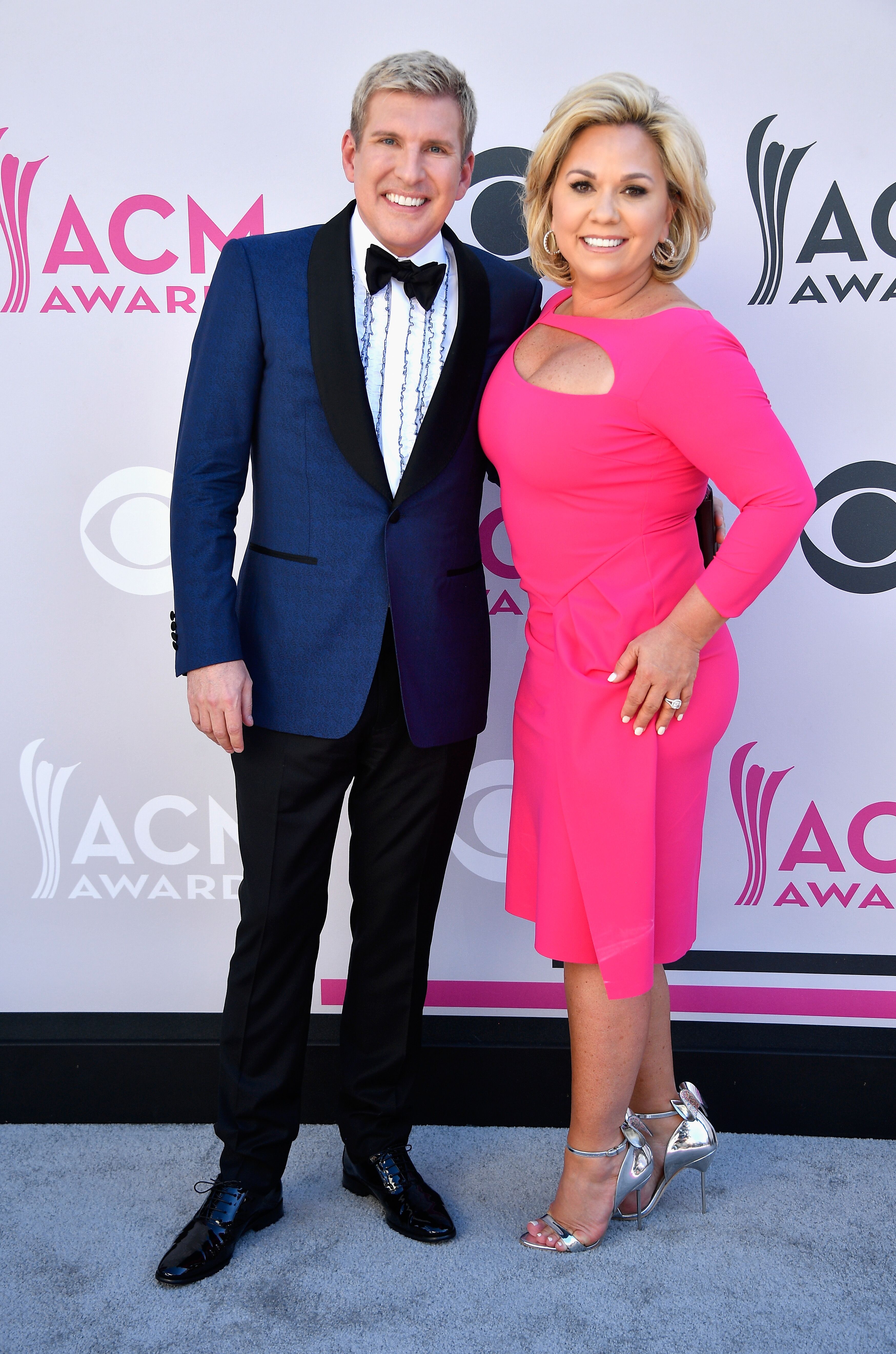 TV stars Todd and Julie Chrisley attend the 52nd Academy Of Country Music Awards at Toshiba Plaza on April 2, 2017 in Las Vegas, Nevada. | Source: Getty Images