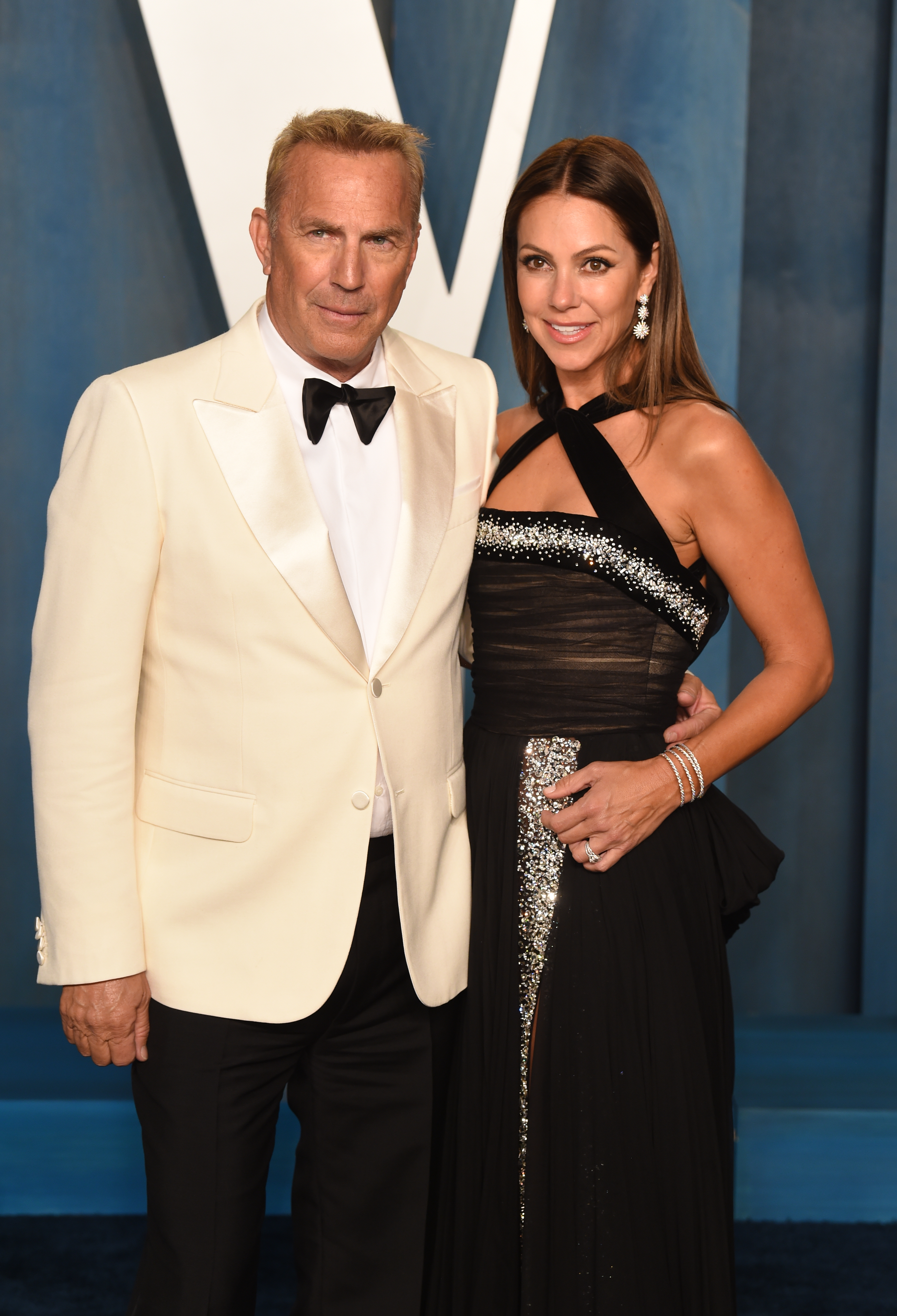 Kevin Costner and Christine Baumgartner at the The 94th Academy Awards Vanity Fair Party in 2022 | Source: Getty Images