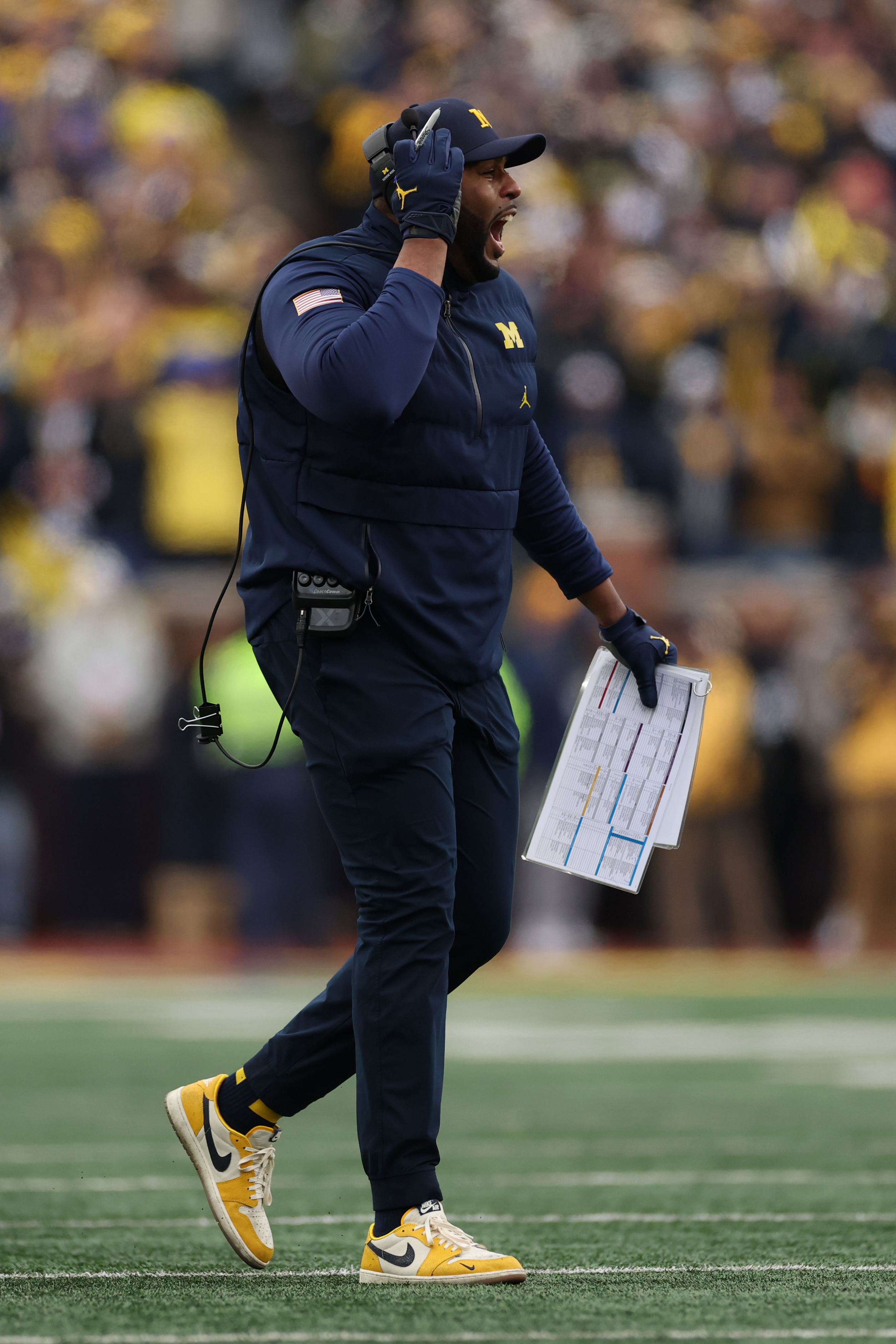 Head coach Sherrone Moore of the Michigan Wolverines reacts on the sideline during the first quarter against the Ohio State Buckeyes on November 29, 2025 | Source: Getty Images