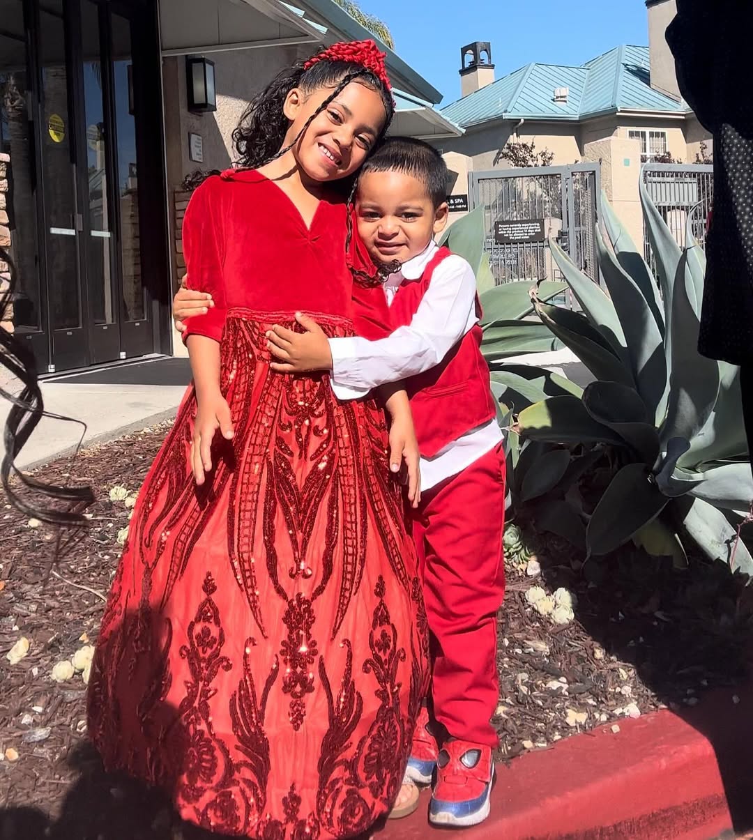 Elleven and Sky Broadus posing outdoors, dated May 2024 | Source: Instagram/e11evenandskylove