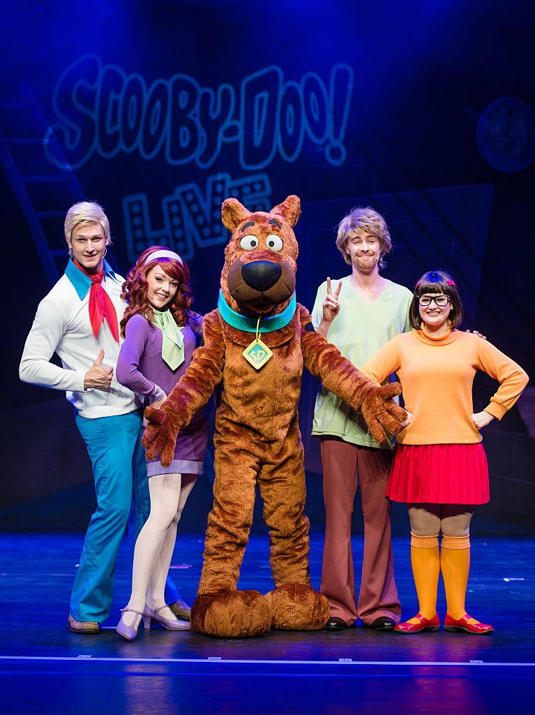 The iconic mystery-solving gang of Scooby-doo in a 2016 broadway show called "Scooby-Doo Live!" at the London Palladium in London. | Photo: Getty Images