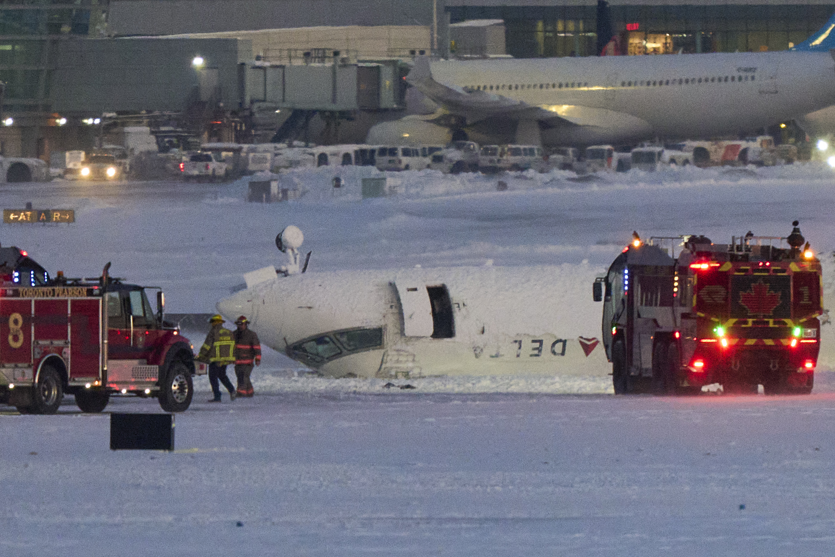 A Delta Air Lines plane pictured after crashing upon landing at Toronto Pearson Airport on February 17, 2025, in Toronto, Ontario. | Source: Getty Images