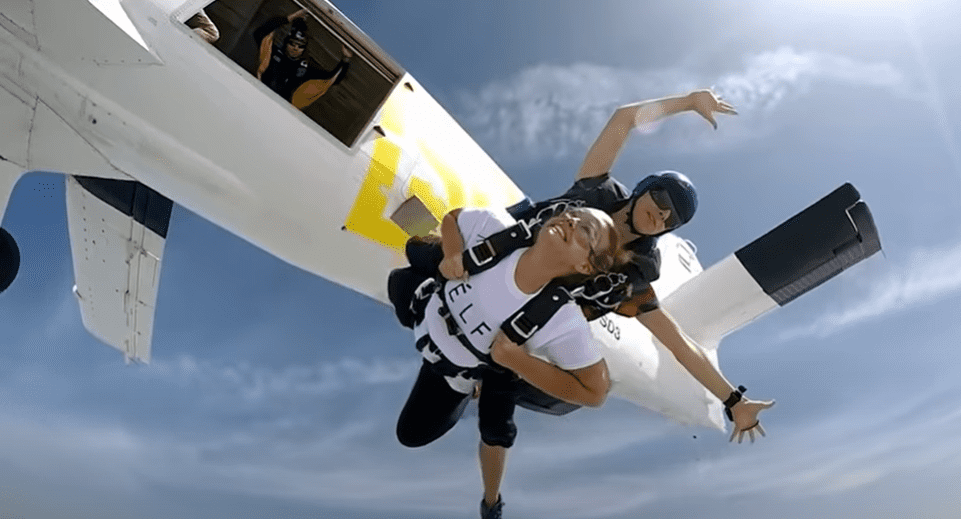 Carli Jay skydiving in Dubai. | Photo: YouTube/Truly