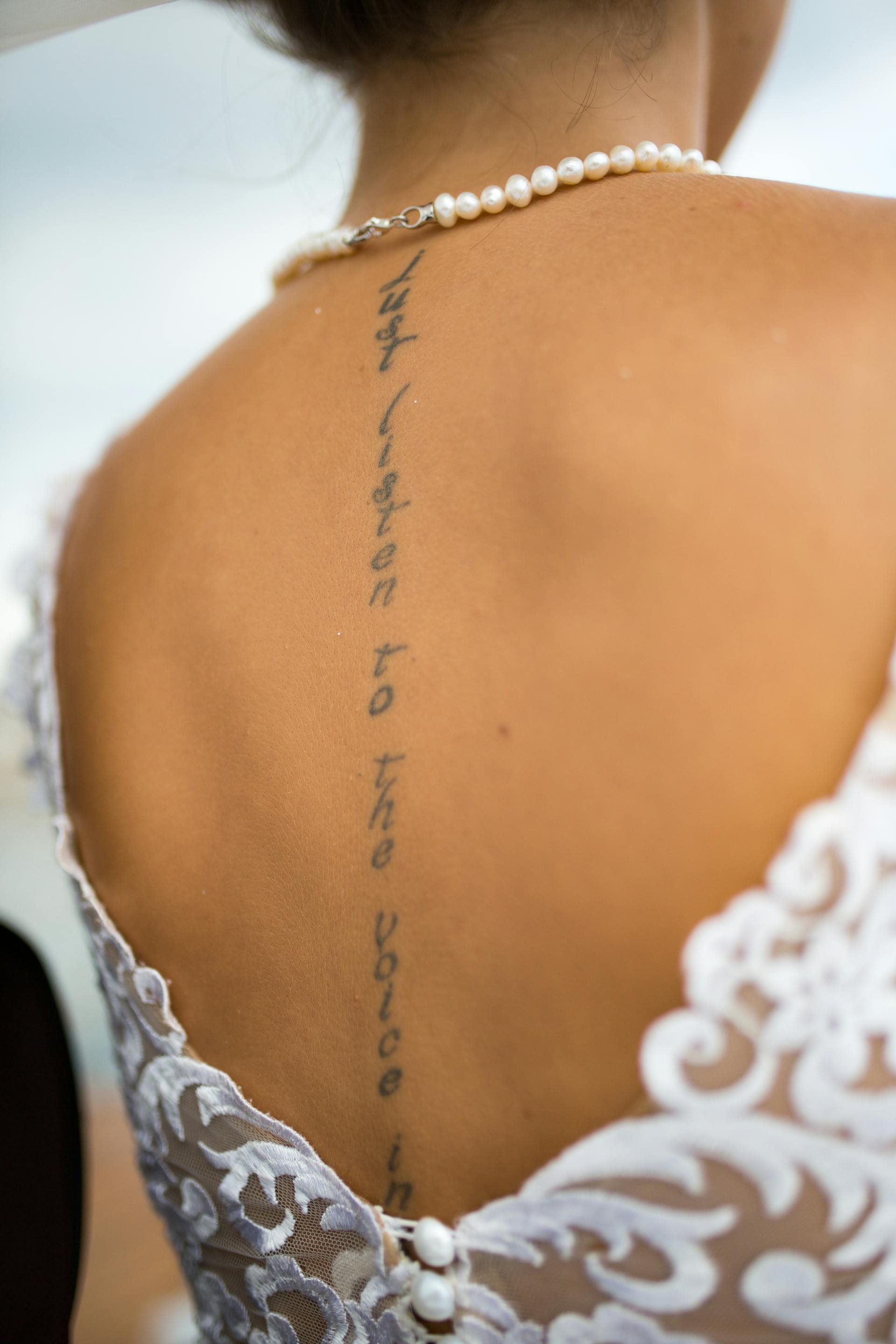 The back of a bride's wedding dress | Source: Pexels