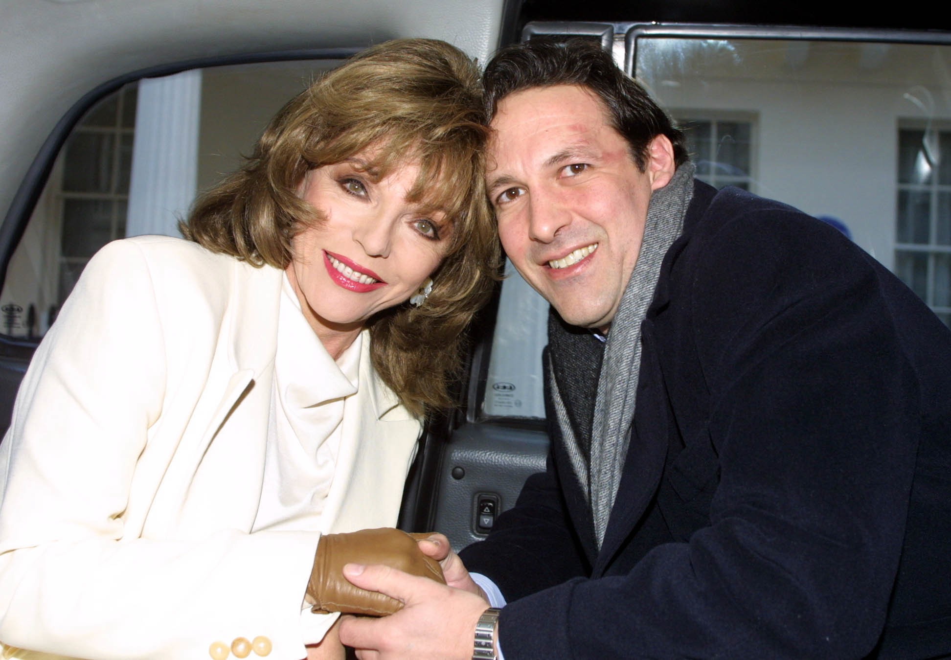 Joan Collins announces her engagement to Percy Gibson in London on December 19, 2001 | Source: Getty Images