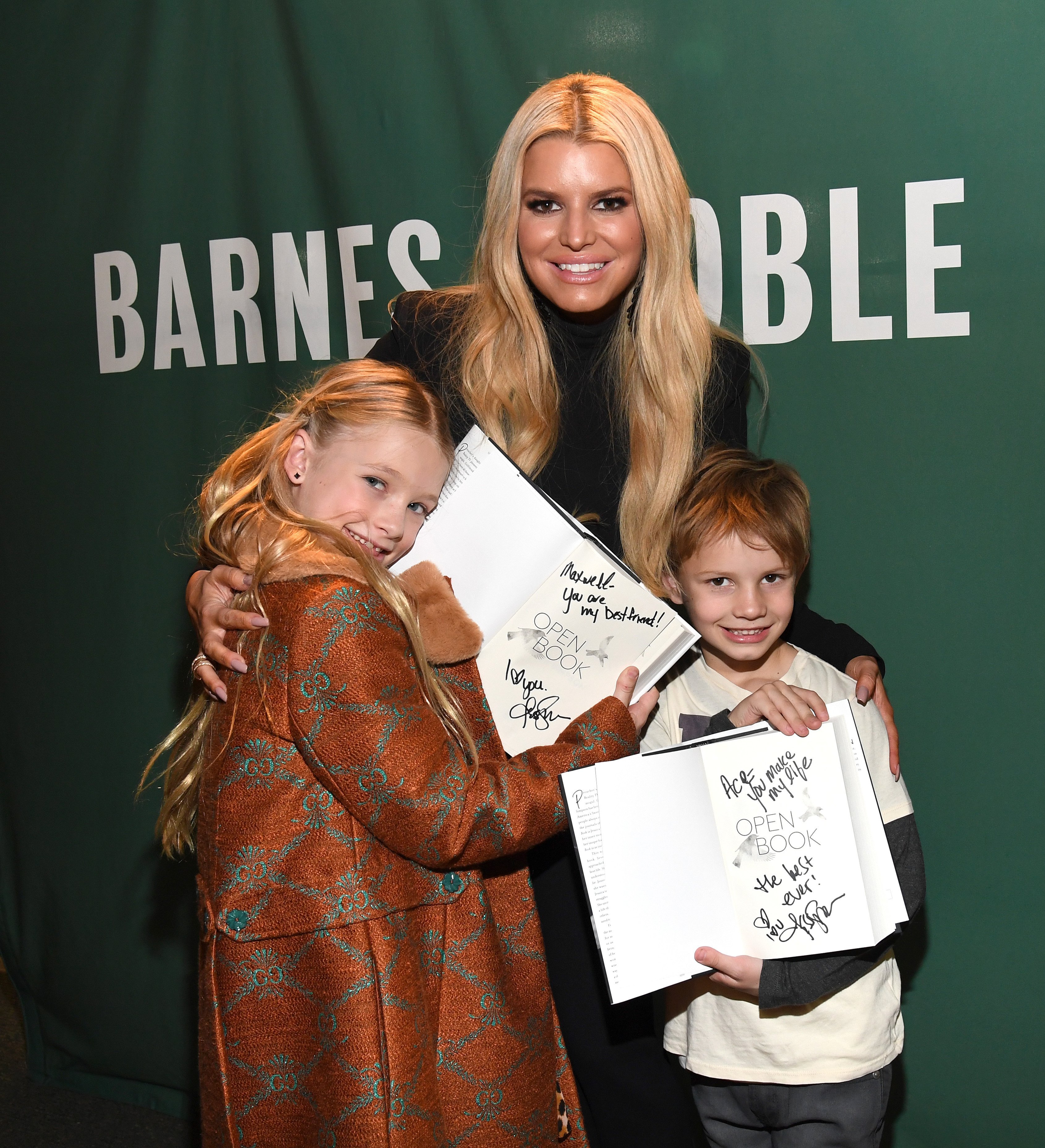 Jessica Simpson signs copies of her new book "Open Book" for her children Maxwell Drew Johnson and Ace Knute Johnson on February 04, 2020, in New York City. | Source: Getty Images.