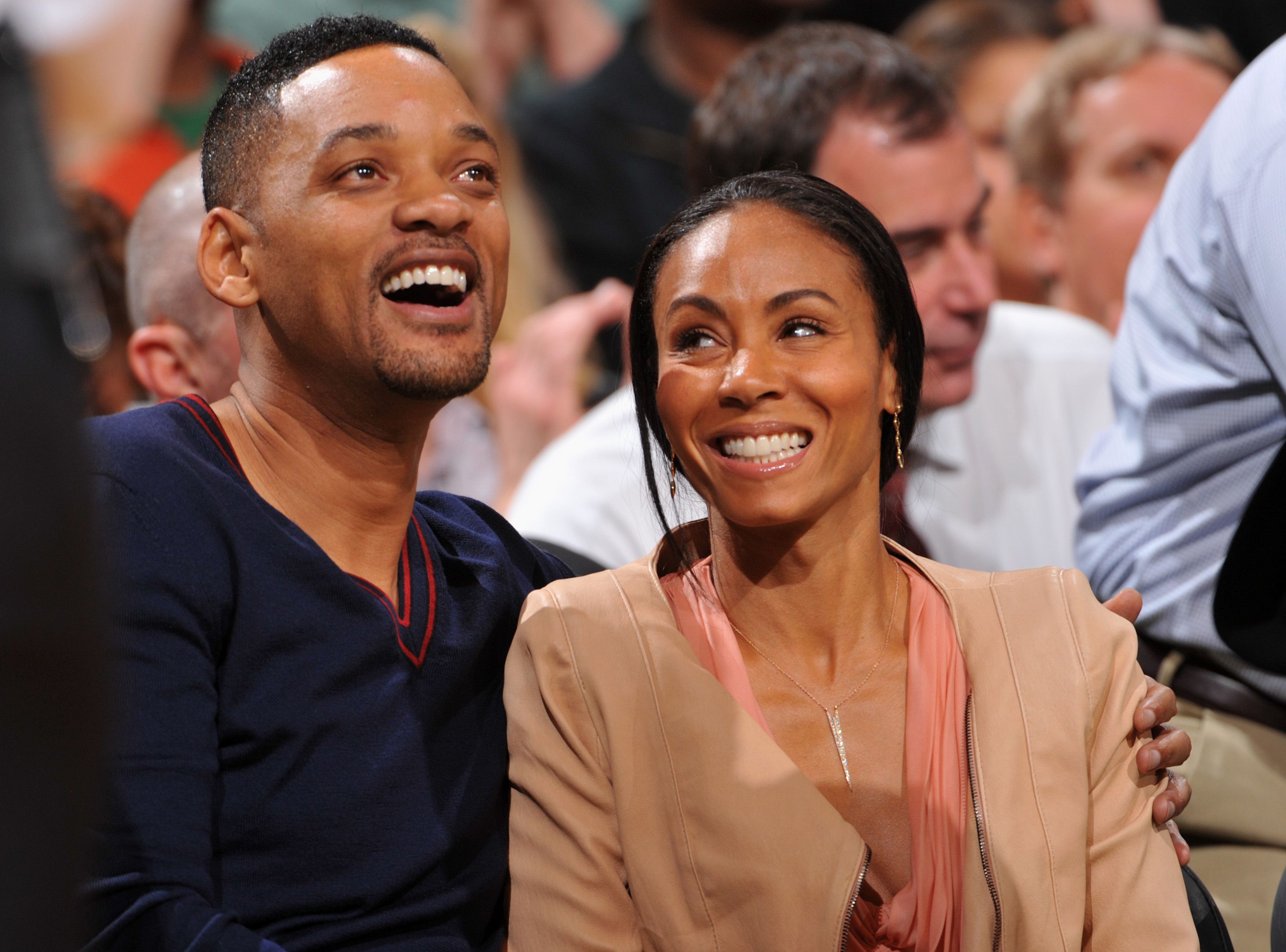 Will Smith and Jada Pinkett watch Game Five of the Eastern Conference Semifinals between the Philadelphia 76ers and Boston Celtics during the 2012 NBA Playoffs on May 21, 2012 at the TD Garden in Boston, Massachusetts. | Source: Getty Images