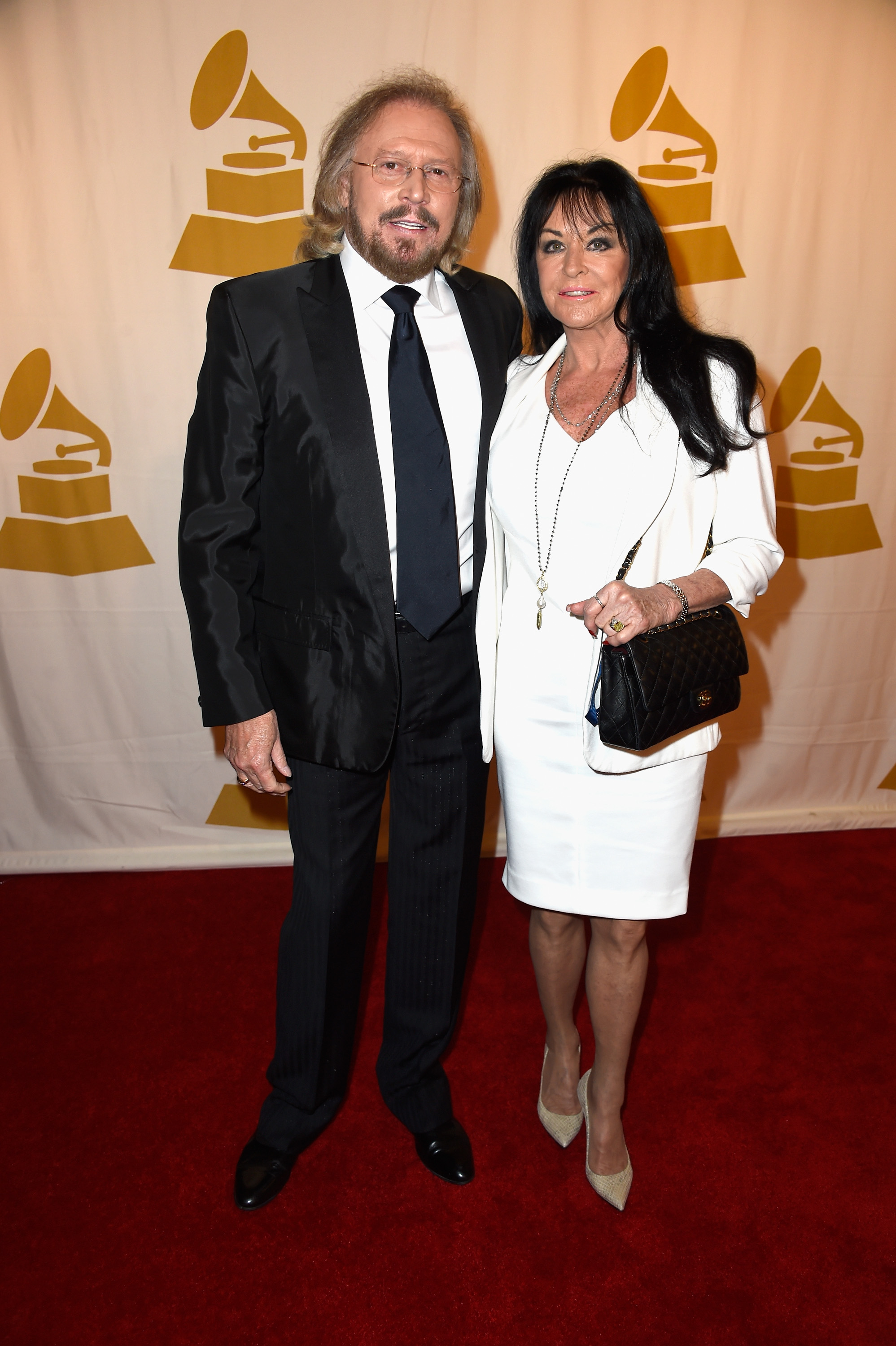 Barry Gibb and Linda Gray at the 57th Annual Grammy Awards in Los Angeles, 2015 | Source: Getty Images