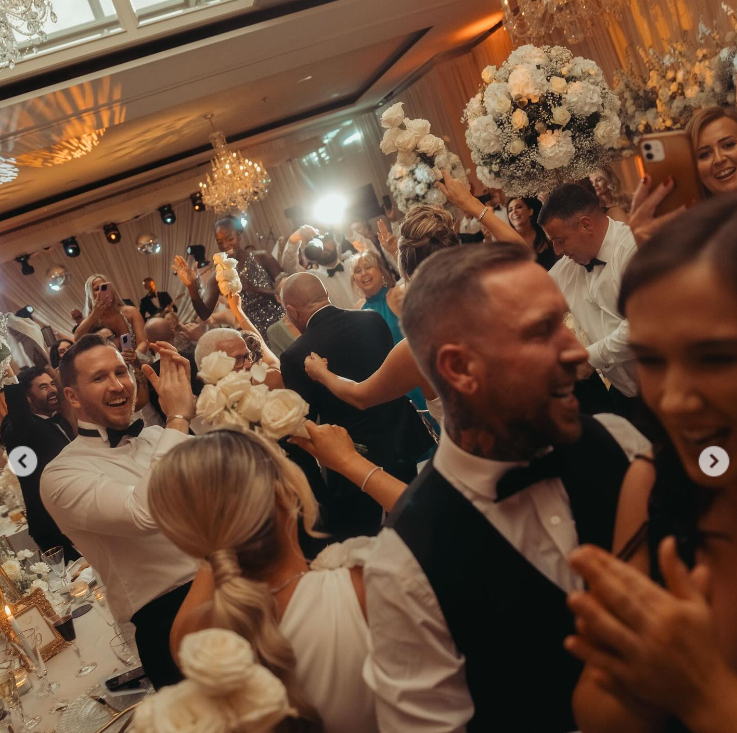 Several guests dance at Terry Kavanagh and Erin McGregor's wedding reception on August 17, 2024 | Source: Instagram/thenotoriousmma