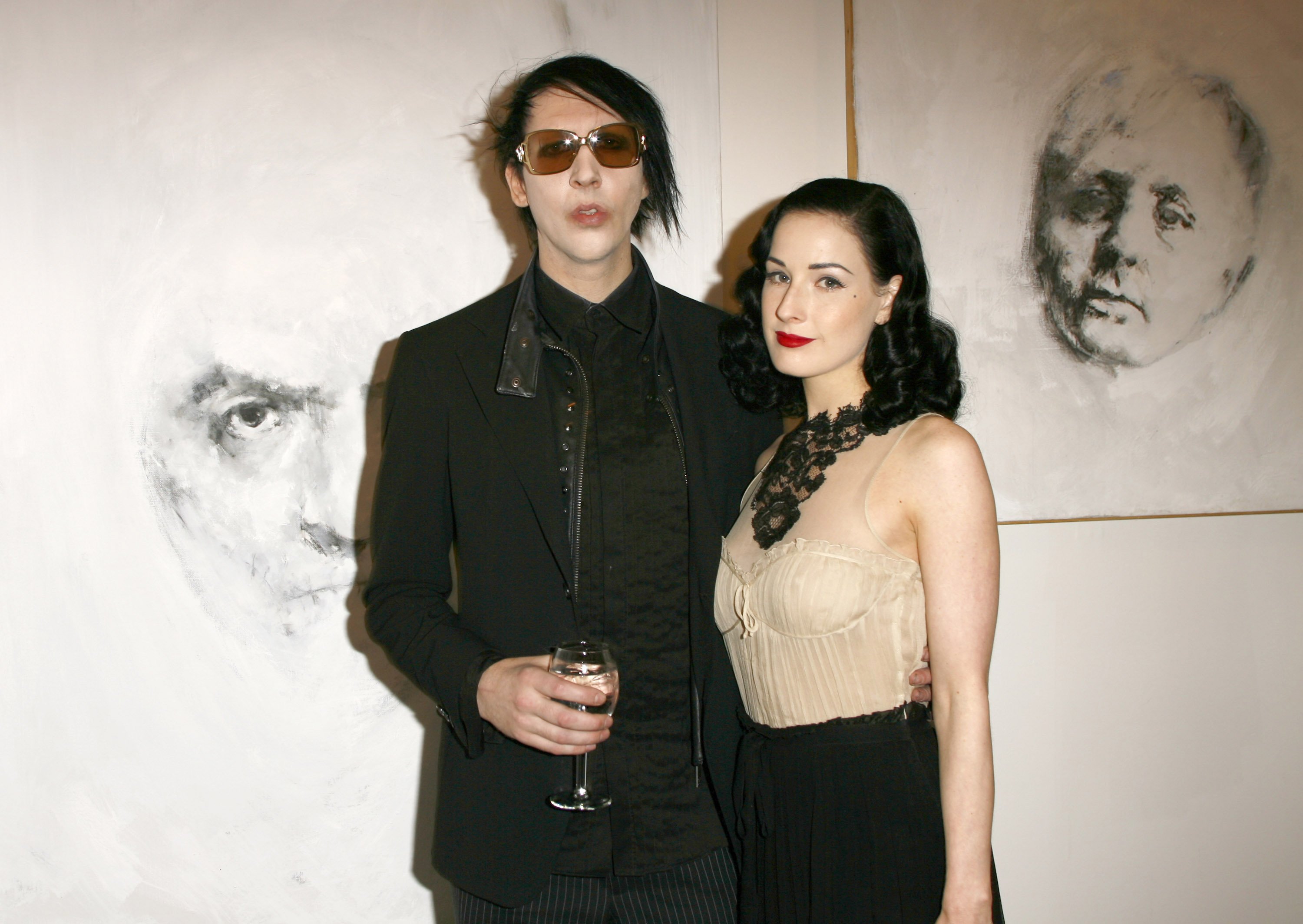 Marilyn Manson and Dita Von Teese at the premiere of the American Exhibition of Gravleur hosted by Johnny Depp and Trigg Ison from June 2 to 20, 2006 | Source: Getty Images