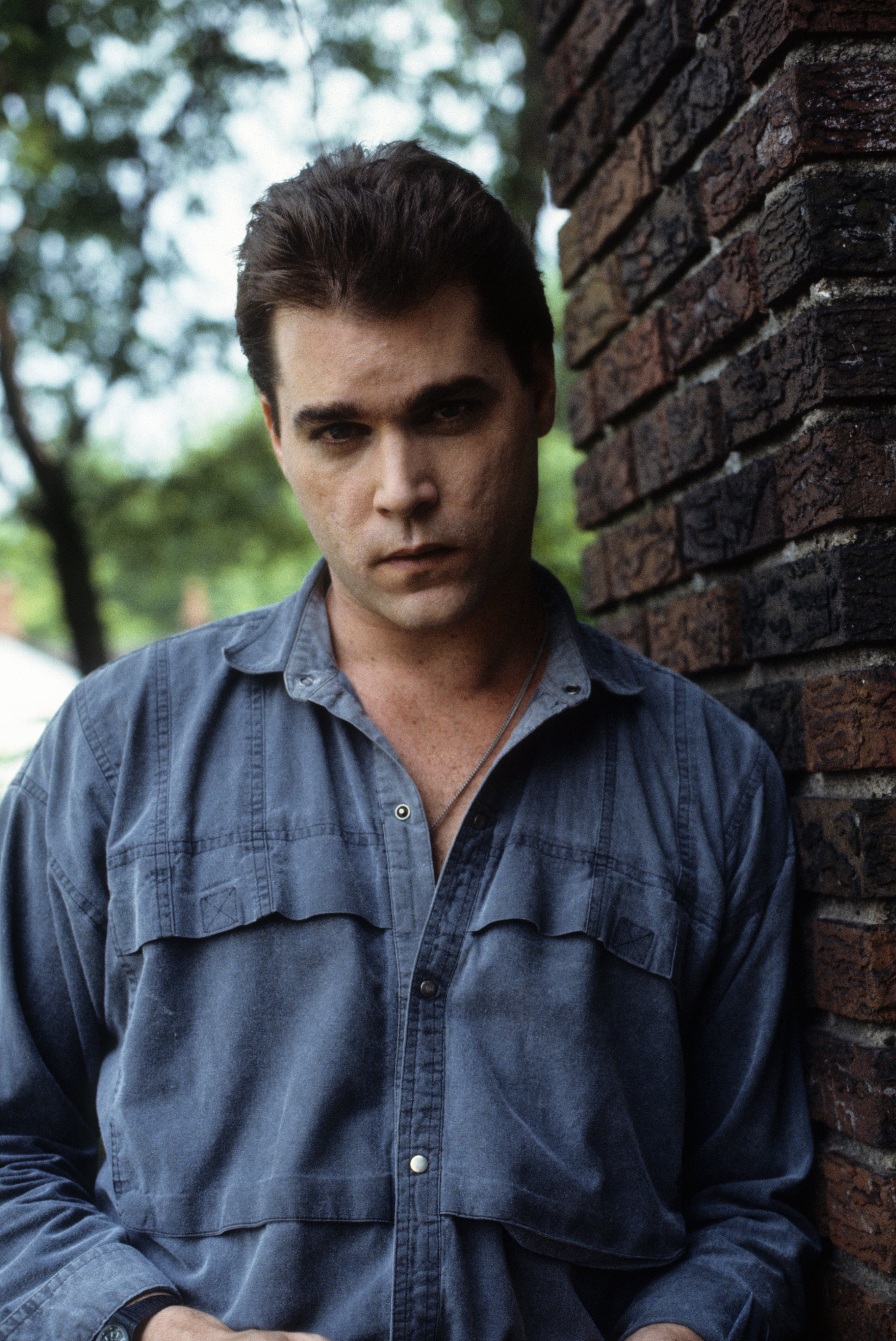 Ray Liotta posing outside in a scene from the film "Dominick and Eugene," in 1988. | Source: Orion Pictures/Getty Images