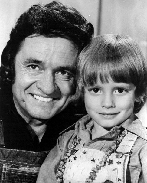 Johnny Cash with son John Carter Cash in 1975 | Source: Wikimedia Commons/Inter-Comm Public Relations, Johnny Cash and Son 1975, marked as public domain