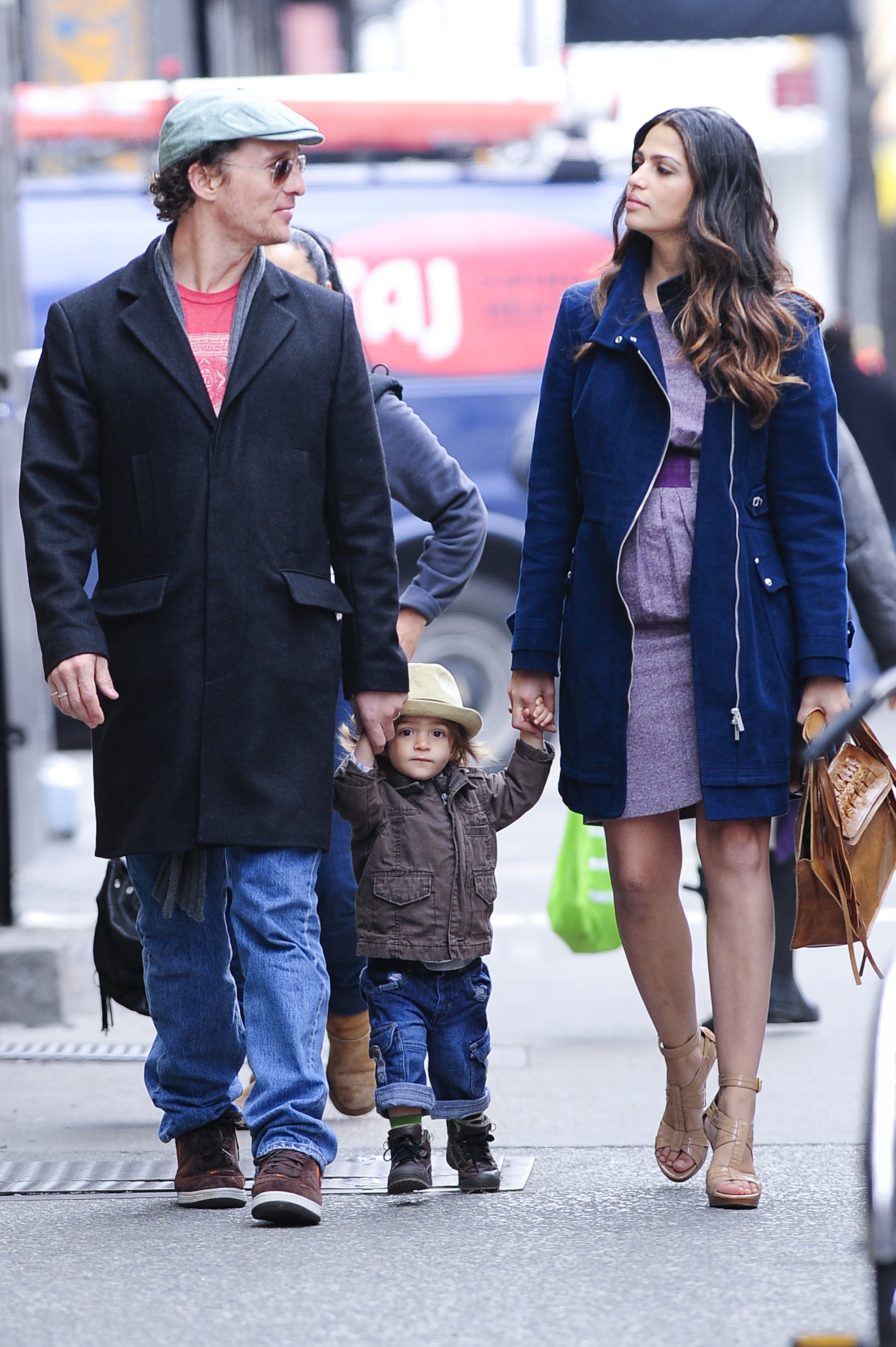 Matthew McConaughey, Levi McConaughey, and Camila Alves walk in Soho in New York City, on March 11, 2010. | Source: Getty Images
