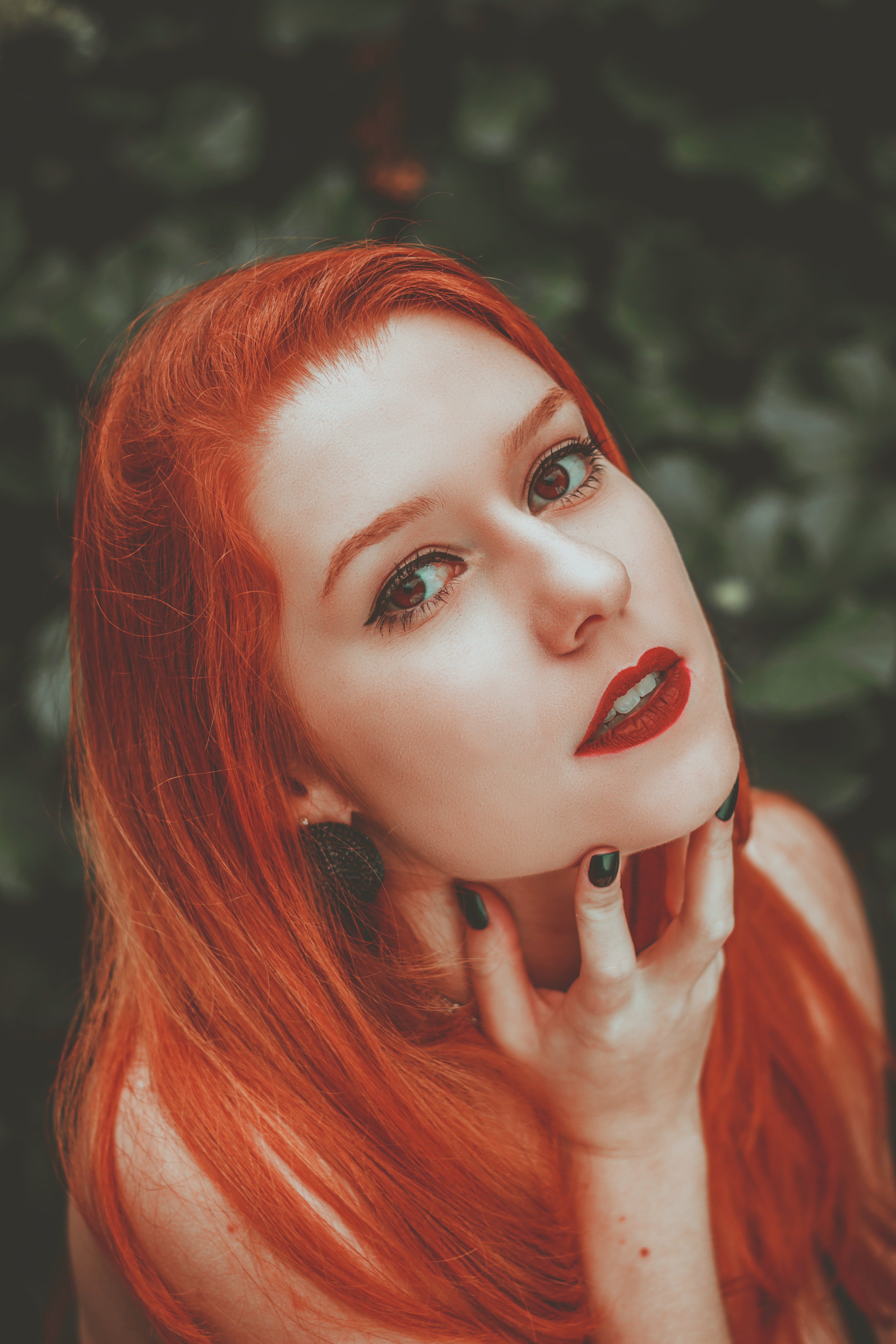 A woman with red hair. | Source: Pexels
