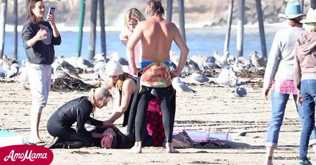 Woman saves her date's life with a dramatic 'first kiss' on the beach