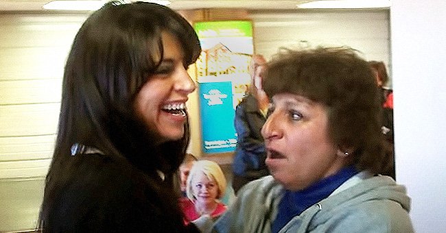 A candid Dina Sierra Hardaway and shocked Jennie Sandoval Sanders pictured during their family reunion. | Source: youtube.com/Jeni59