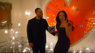 Eric Murphy looking at Jasmin Lawrence with happiness and love as she screams about being engaged. | Source: Instagram/jasmin_lawrence