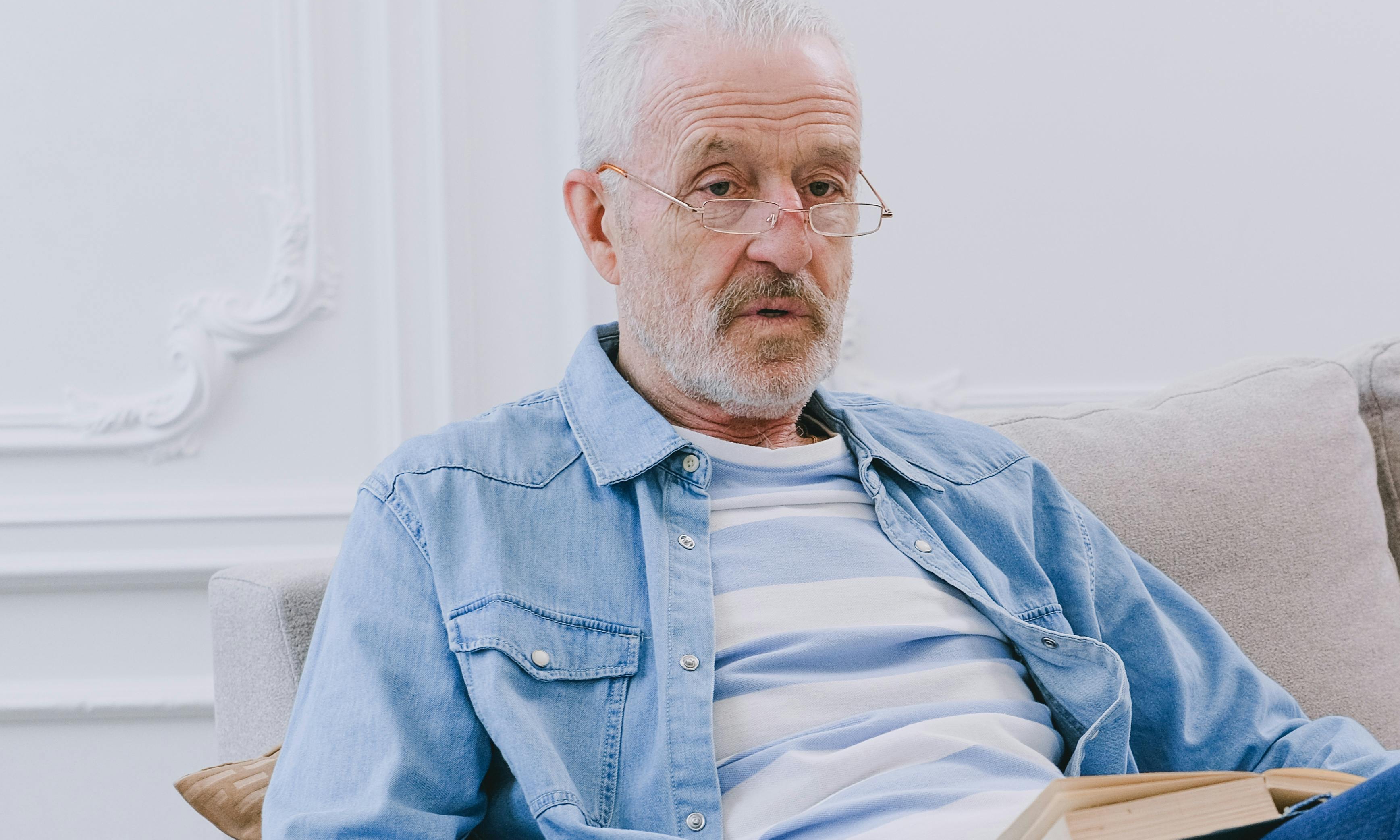 John announcing his decision to use the inheritance for university to his sons | Source: Pexels