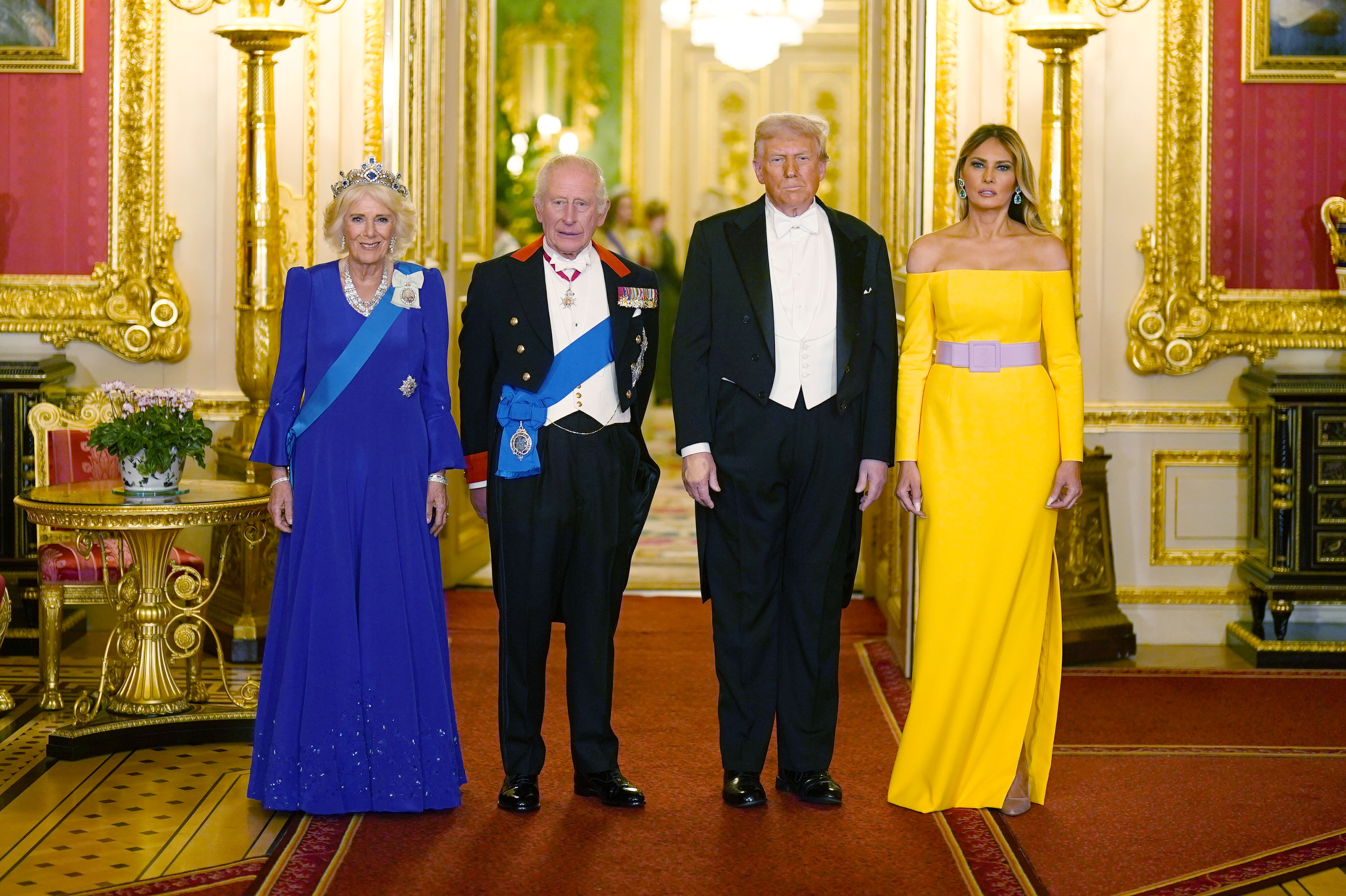 Queen Camilla, King Charles III, Donald and Melania Trump posing for a photo at the event in Windsor Castle. | Source: Getty Images