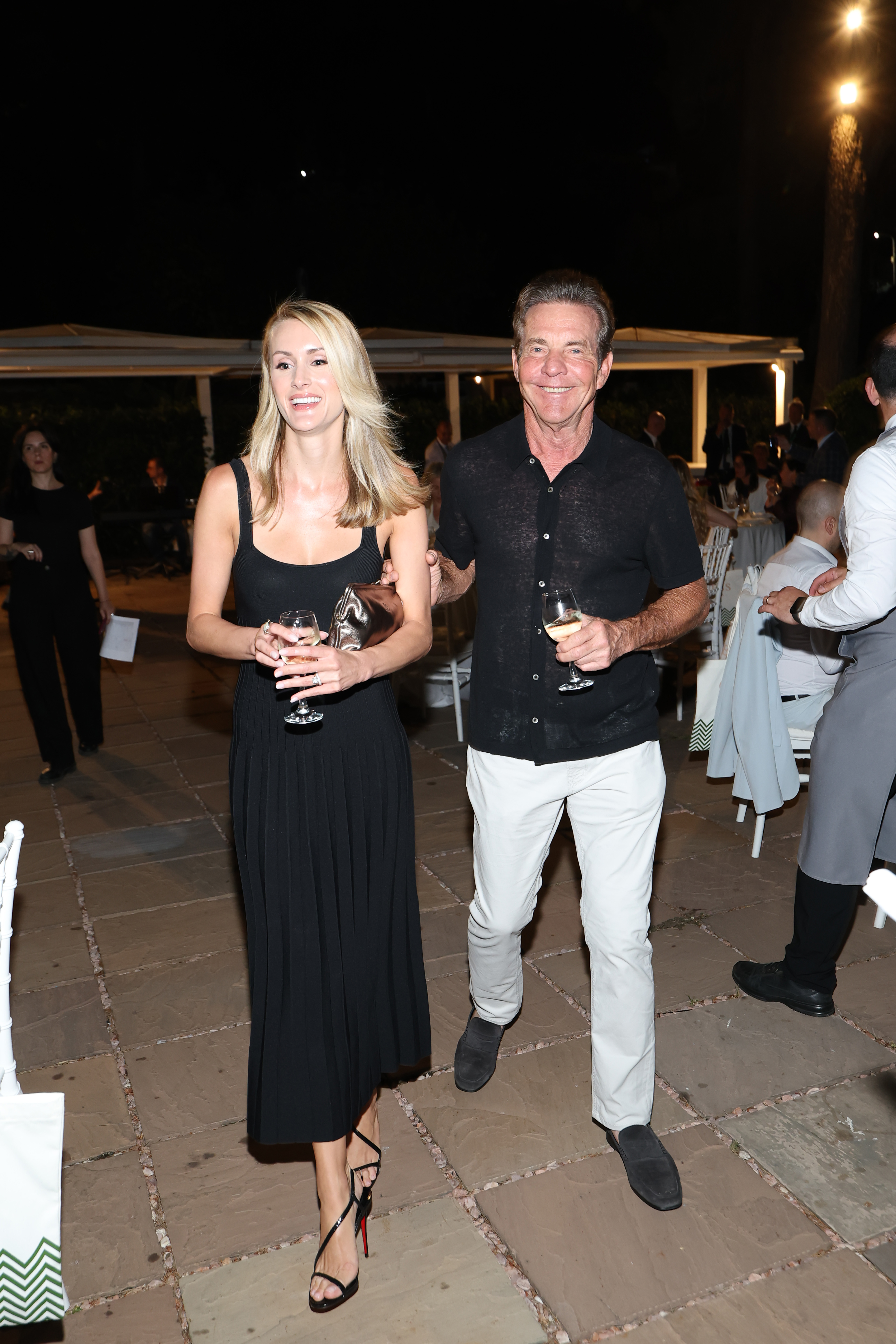 Laura Savoie and Dennis Quaid are pictured at the 71st Taormina Film Festival on June 10, 2025, in Italy | Source: Getty Images