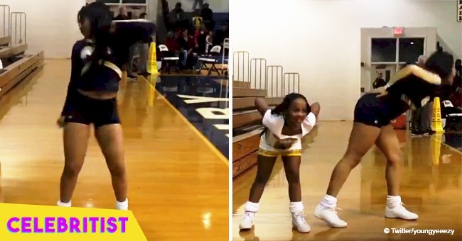 Little girl joins her cheerleader sister to show some energetic dance moves together