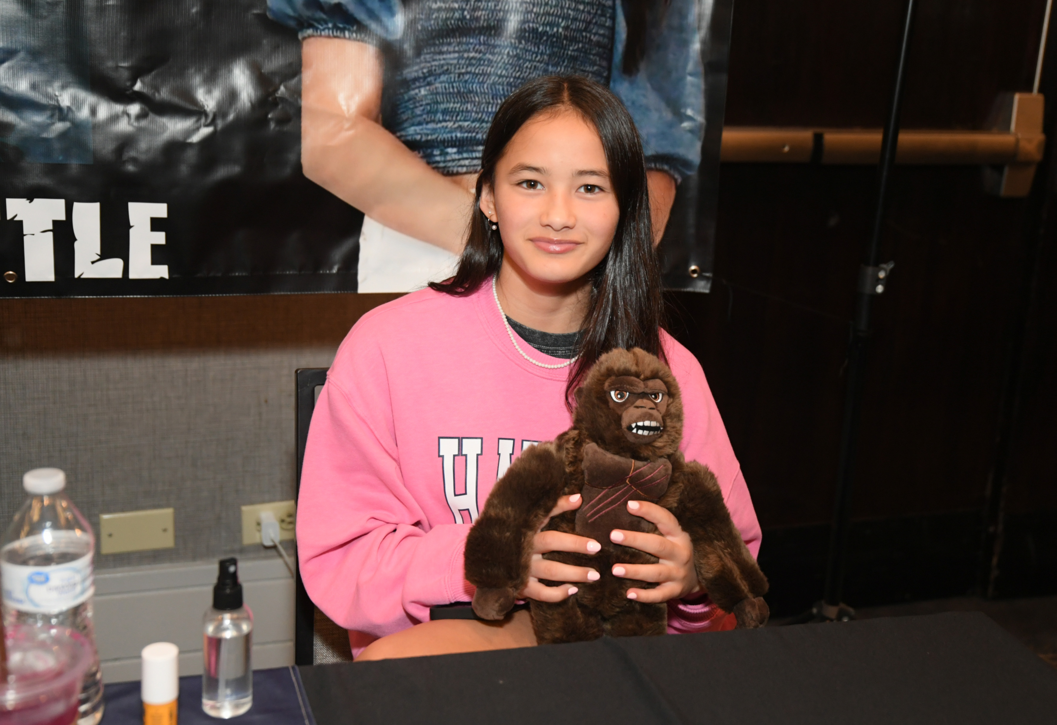 This photo shows Kaylee Hottle during one of her public appearances after gaining recognition for her role in the "Godzilla" franchise. Holding a King Kong plush toy, she appeared at an event celebrating Japanese pop culture, reflecting the growing connection between her career and the monster film series that introduced her to audiences worldwide. | Source: Getty Images