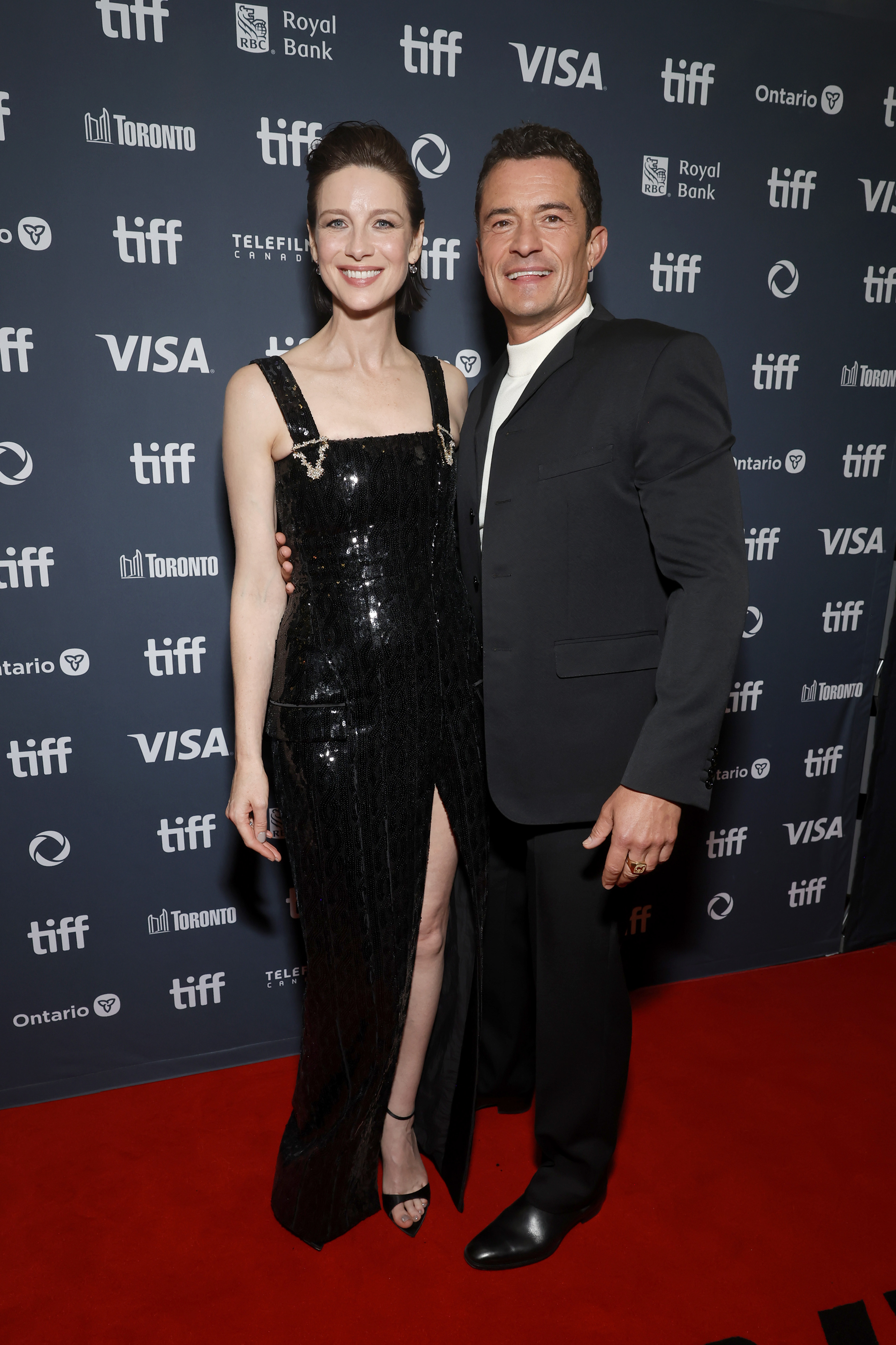 Caitriona Balfe and Orlando Bloom attend the premiere of "The Cut" during the Toronto International Film Festival on September 5, 2024 | Source: Getty Images