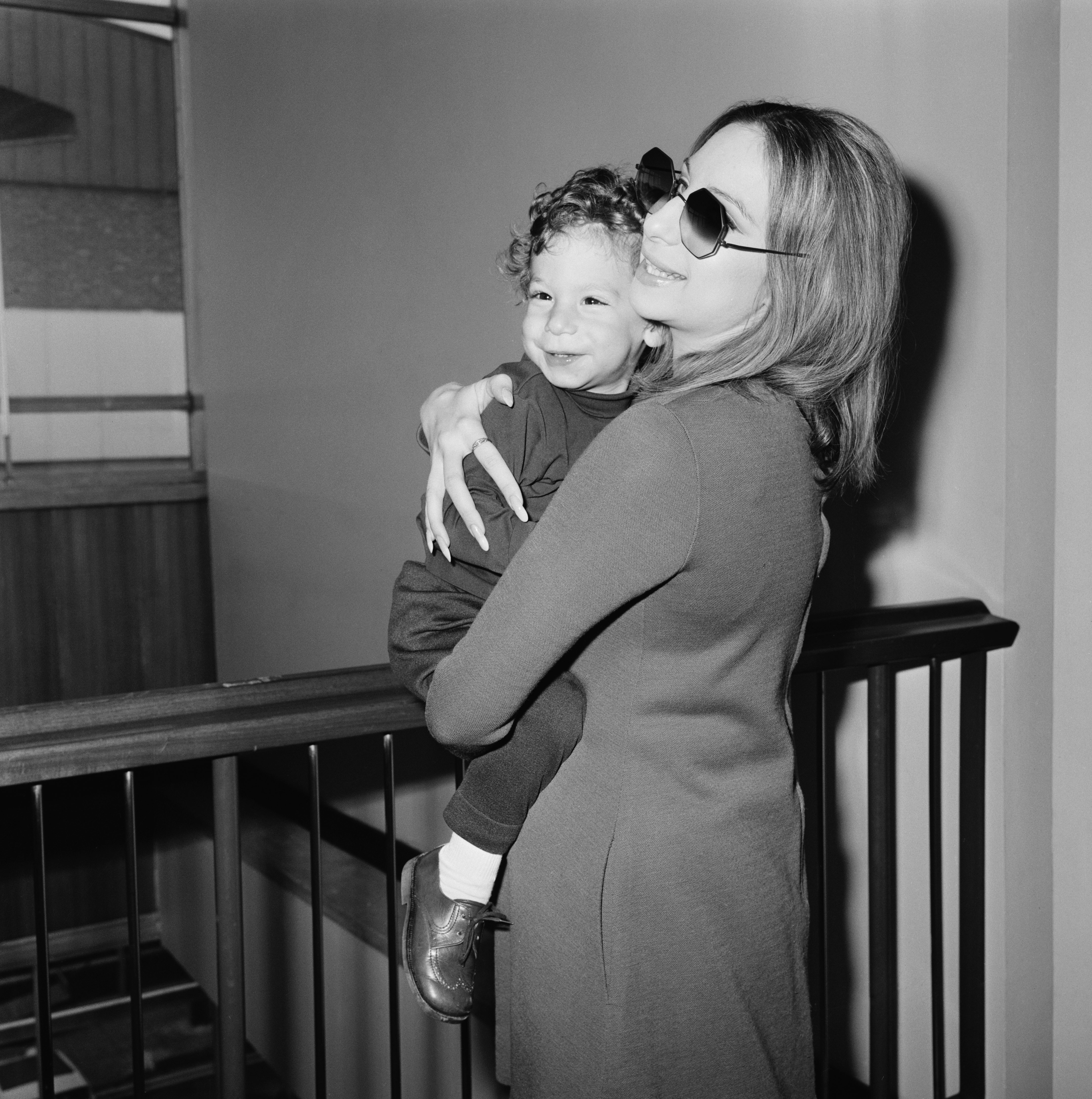 Us actress and singer, Barbra Streisand with her son Jason Gould at Heathrow Airport UK on April 11, 1969. | Source: Getty Images
