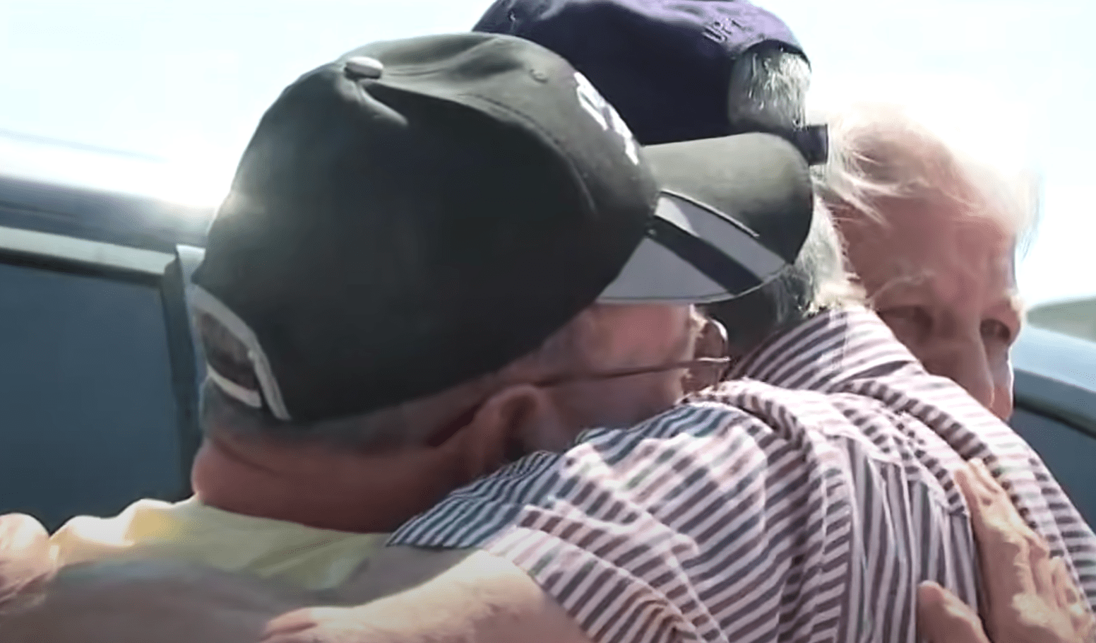 Veterans are tearful as they embrace each other during a surprise reunion. | Source: youtube.com/KTVB 