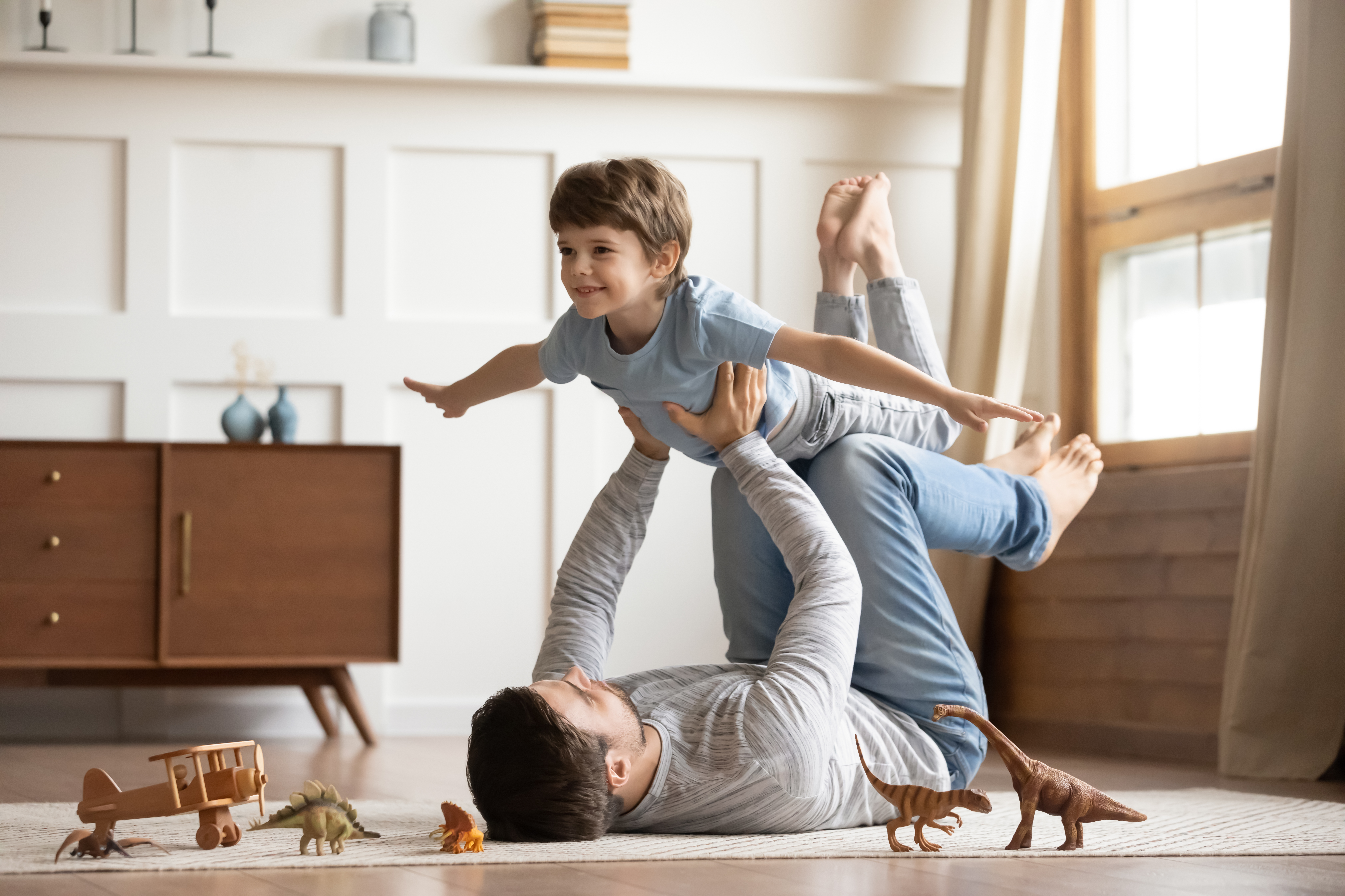 Father and son playing | Source: Shutterstock