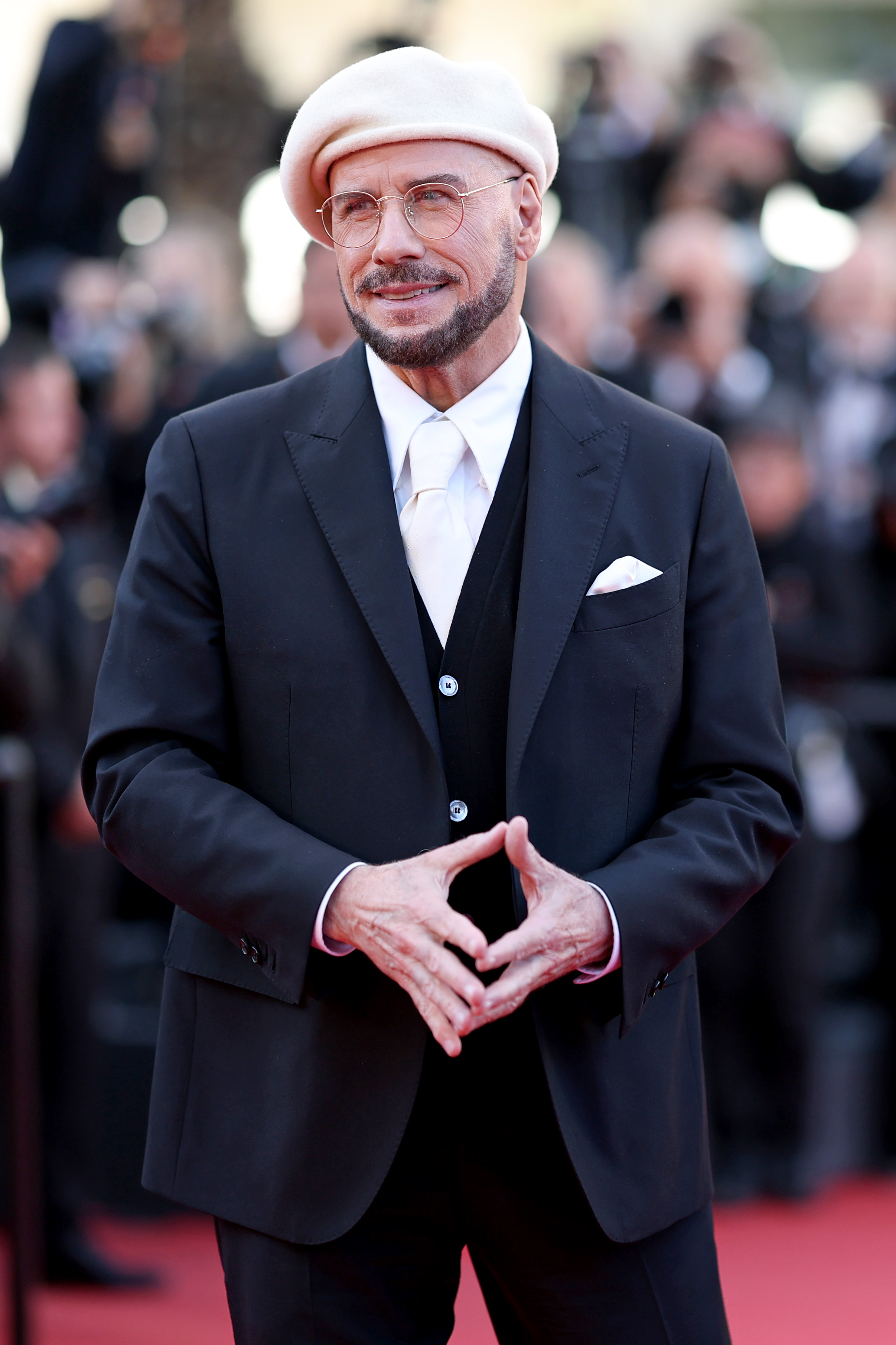 John Travolta attends the "Karma" screening during the 79th annual Cannes Film Festival at Palais des Festivals on May 15, 2026 in Cannes, France. | Source: Getty Images